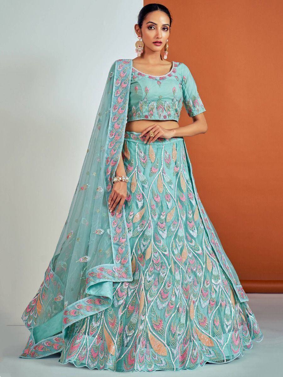 Mint green designer lehenga choli with pink and gold embroidery, perfect for weddings and parties