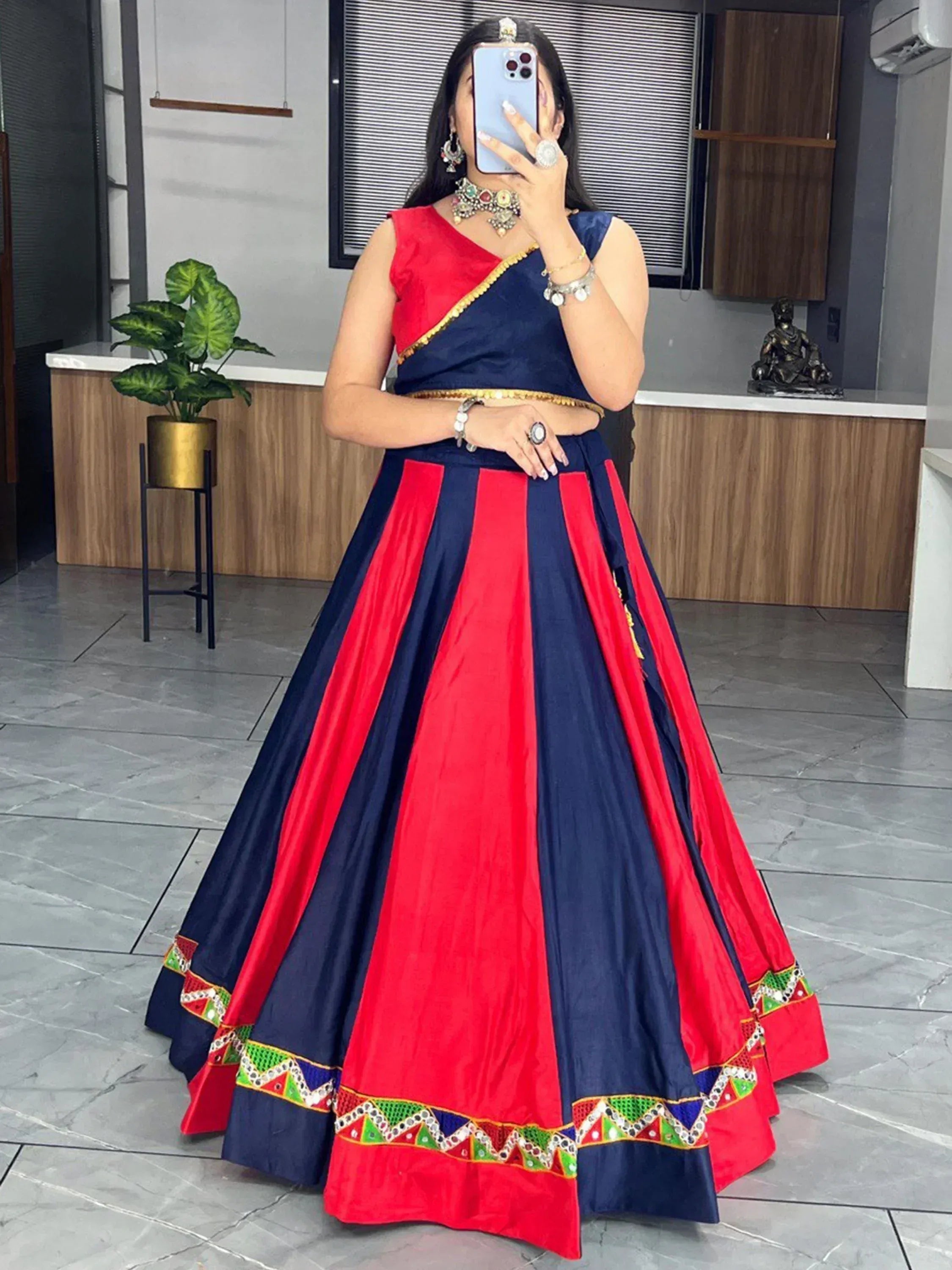 Red and navy blue designer lehenga choli with mirror work, perfect for Indian ethnic wear occasions