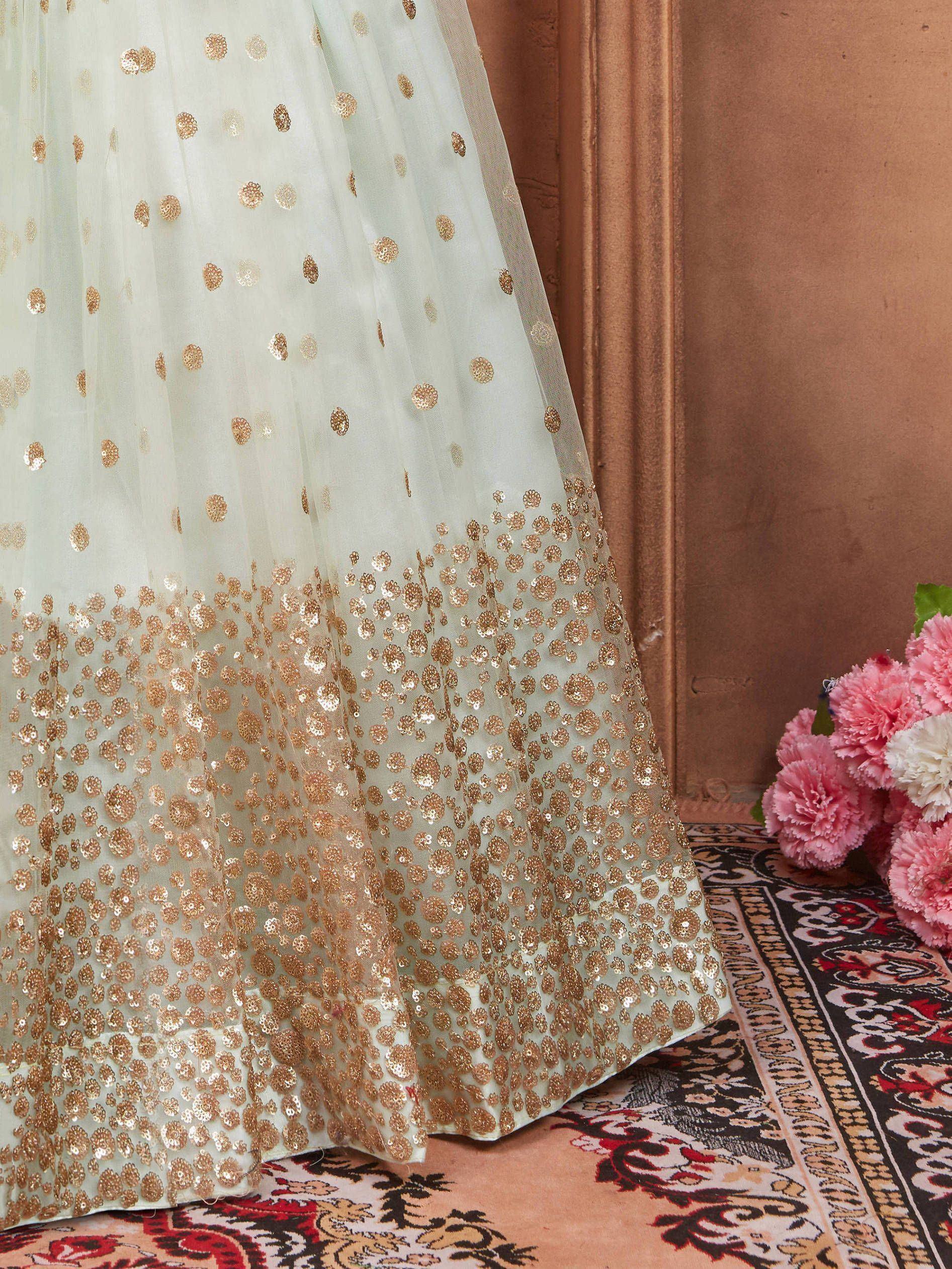 Mint green lehenga skirt with gold sequin polka dots, ethnic wear for weddings