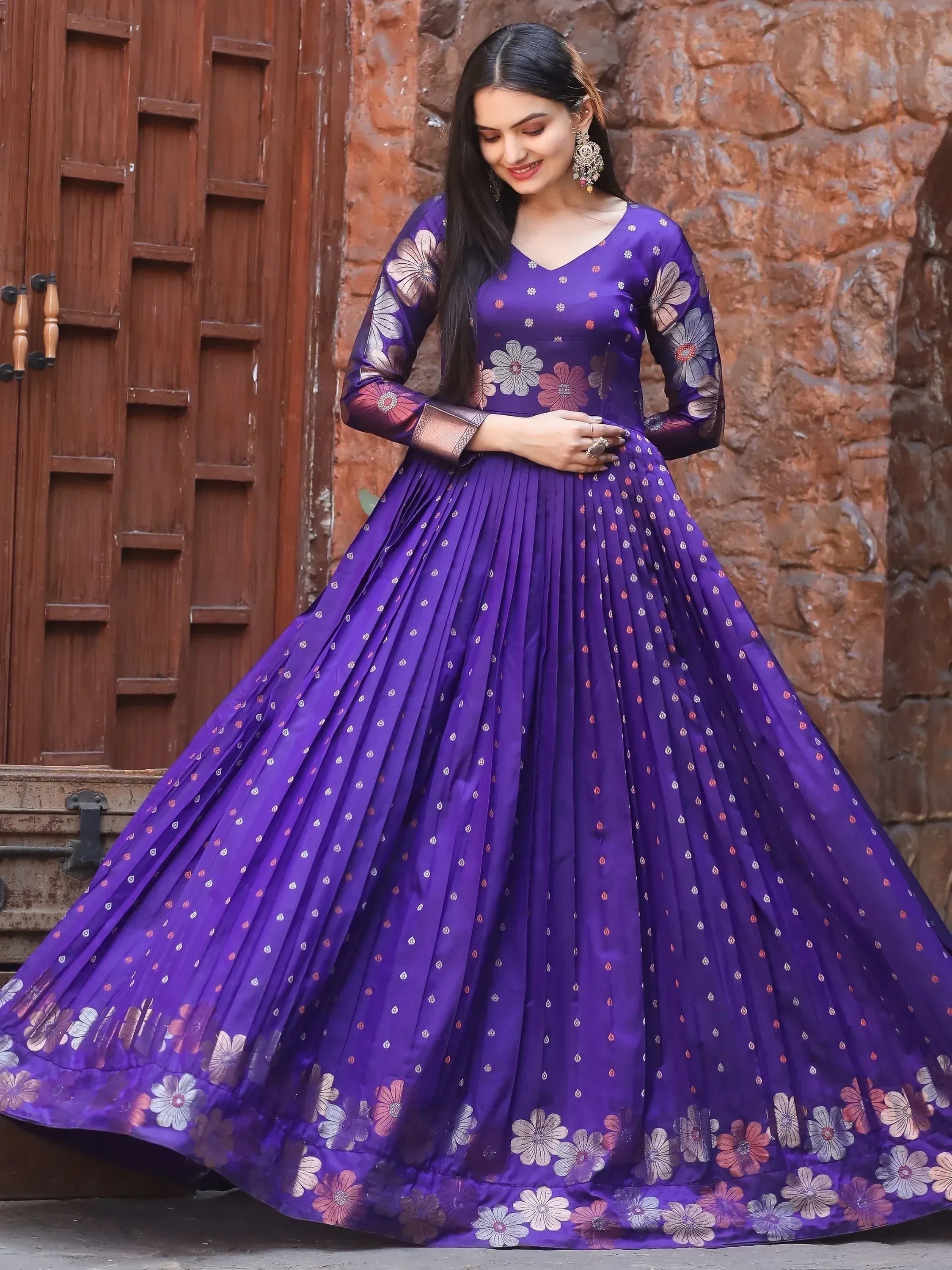 Purple floral print ethnic gown with pleated skirt, perfect for Indian occasions and festive wear