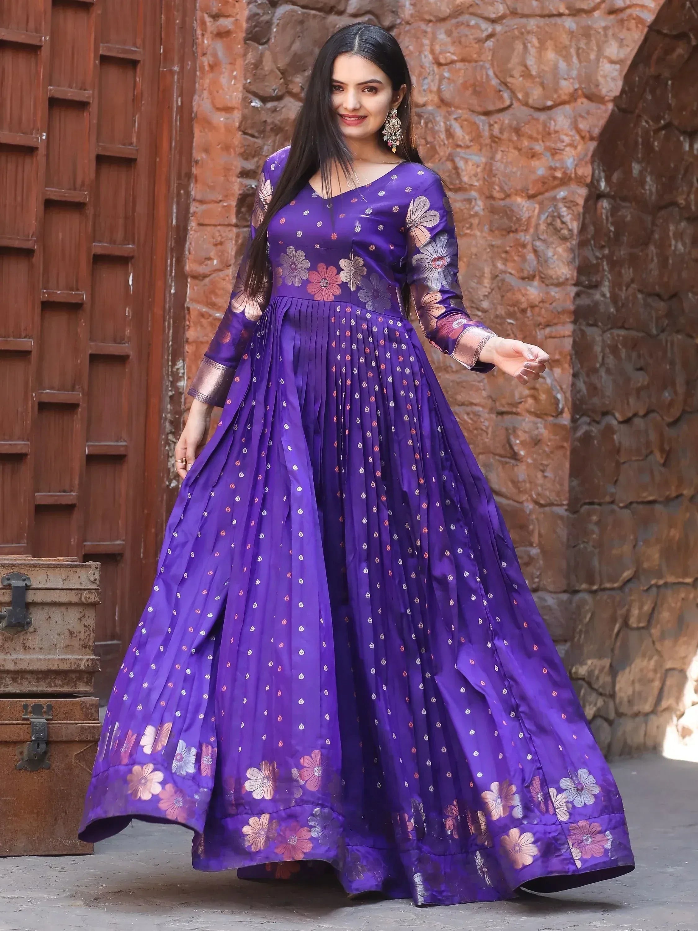 Purple floral ethnic gown with pleated skirt, perfect for Indian occasions and festive wear