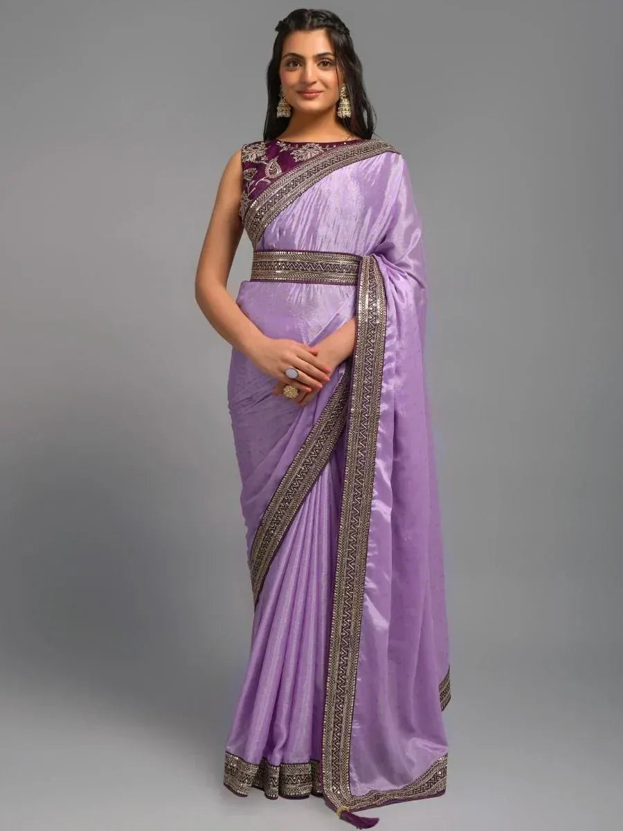 Purple silk saree with embroidered border and matching blouse, perfect for Indian ethnic occasions