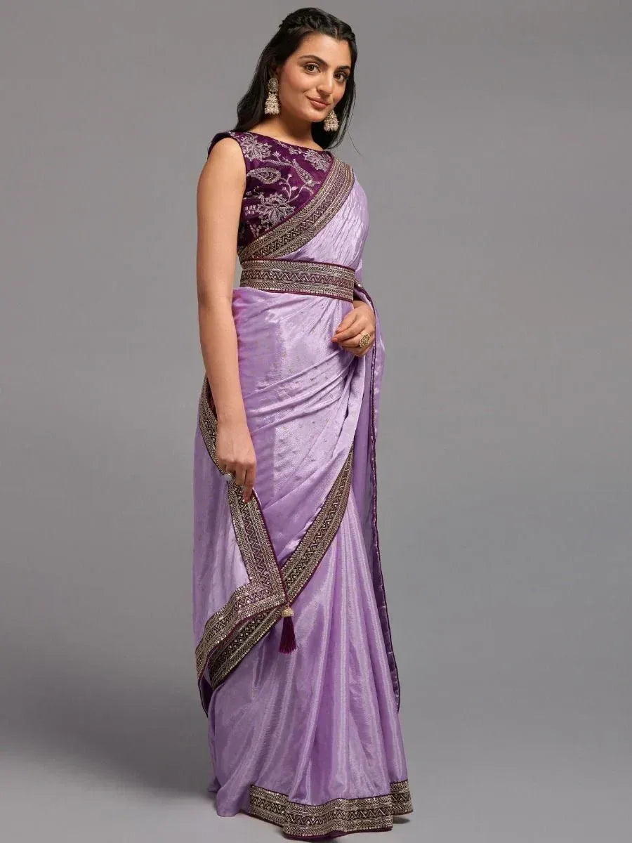 Purple embroidered saree with gold border, perfect for Indian ethnic occasions