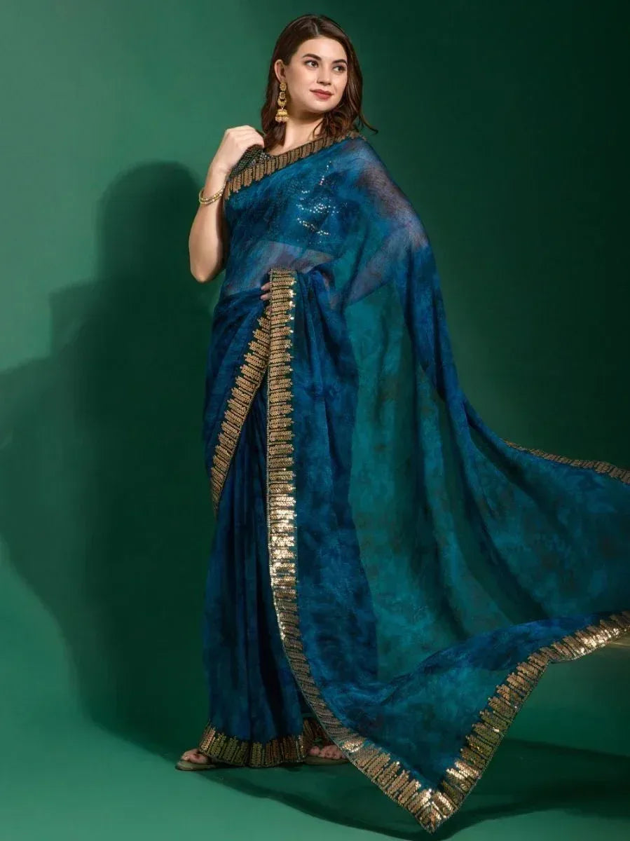 Blue designer saree with gold border, perfect for Indian ethnic wear occasions