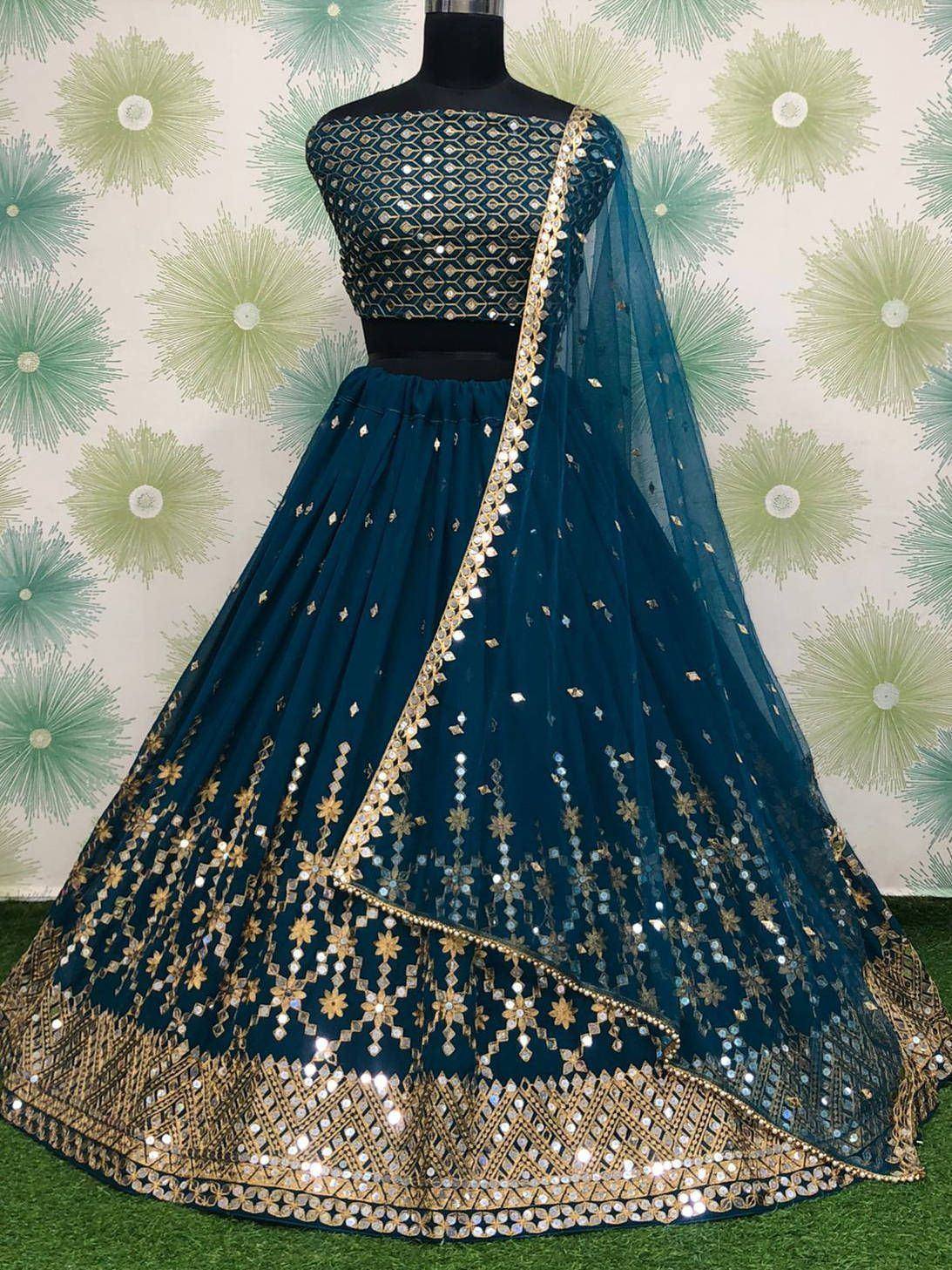 Teal blue designer lehenga choli with gold mirror work and sequins, ethnic Indian wear