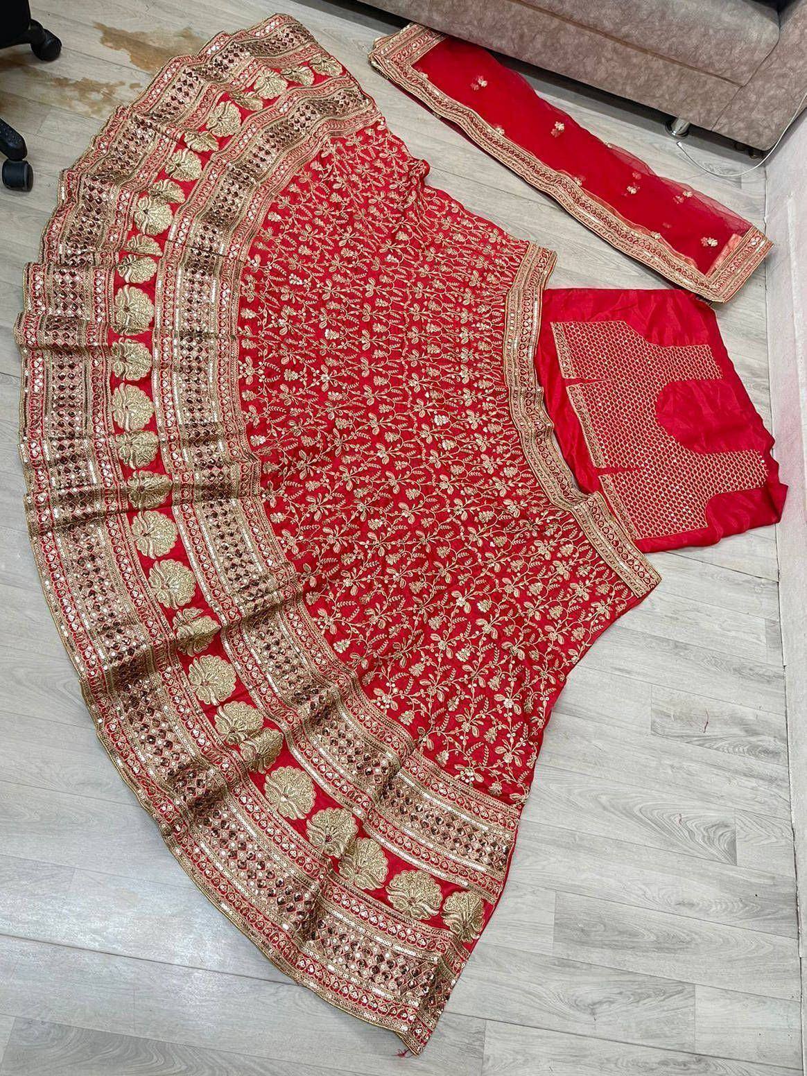 Red designer lehenga choli with gold embroidery and net dupatta, ethnic Indian wear