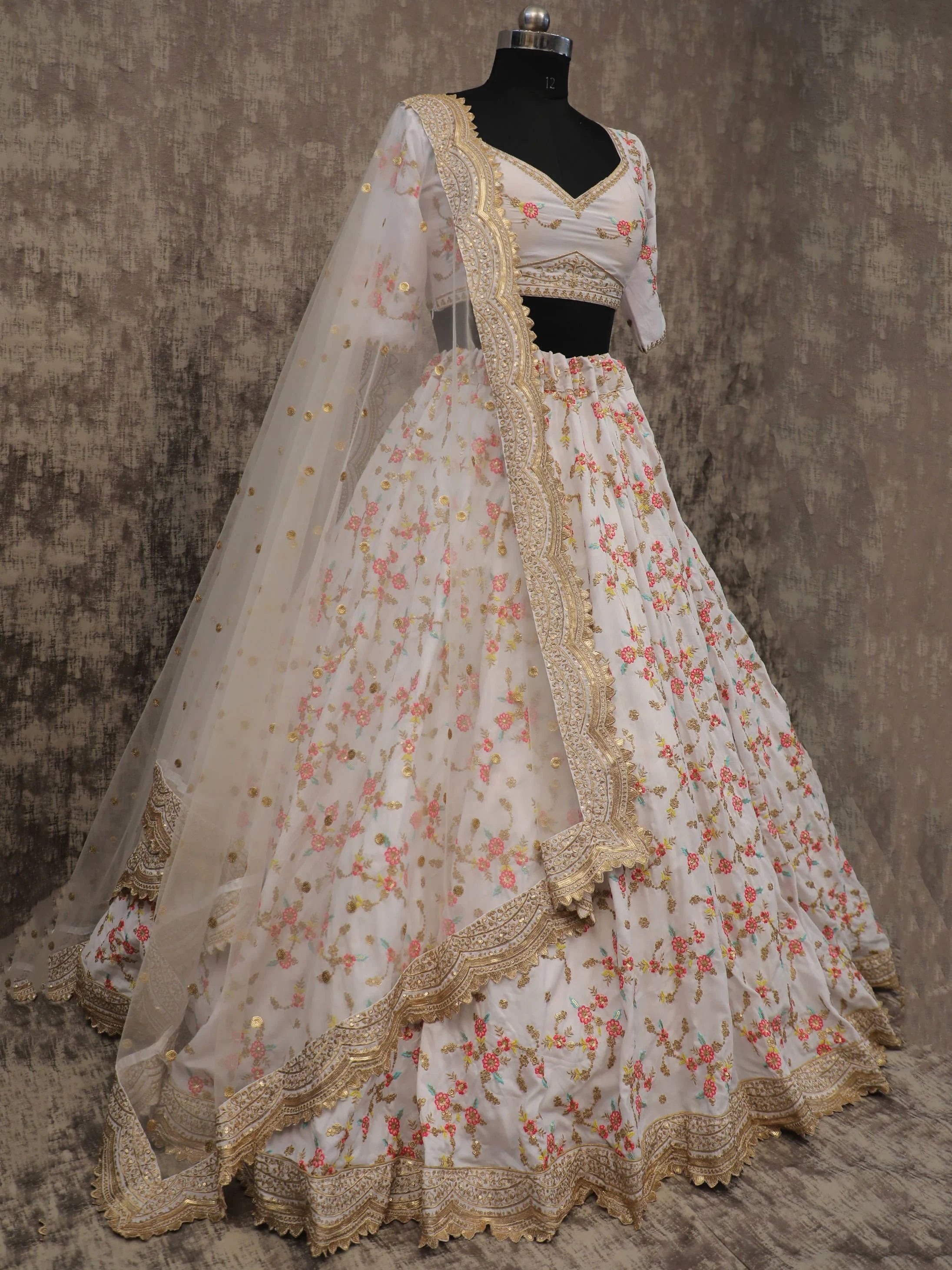 Awesome White Embroidery Chinon Silk Wedding Wear Lehenga Choli