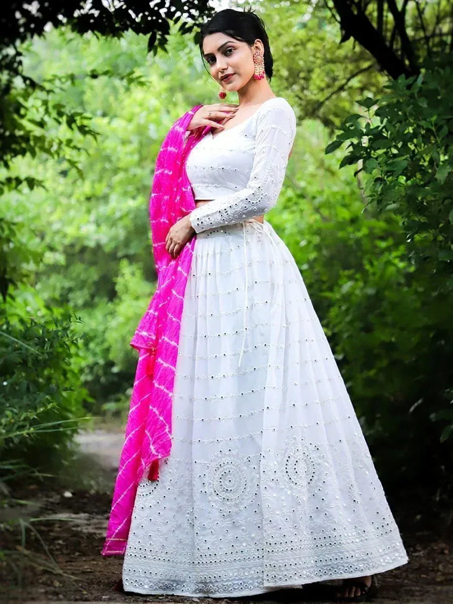 White embroidered lehenga choli with pink dupatta, perfect for Indian ethnic wear occasions