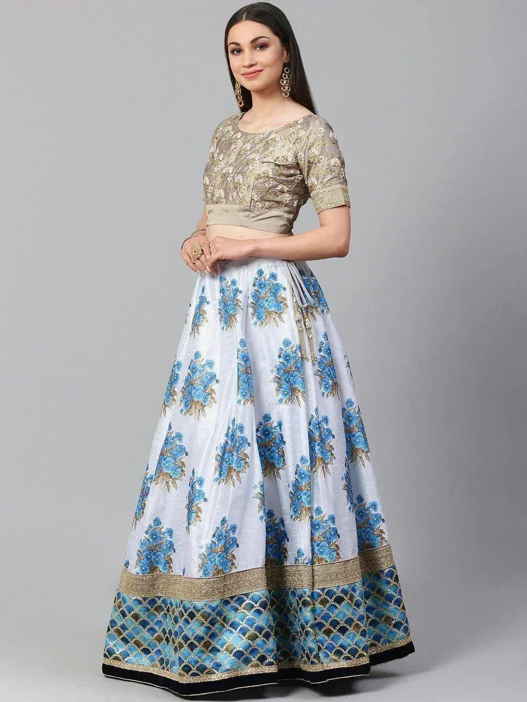 Blue floral print lehenga choli with gold embroidery, perfect for Indian ethnic wear occasions