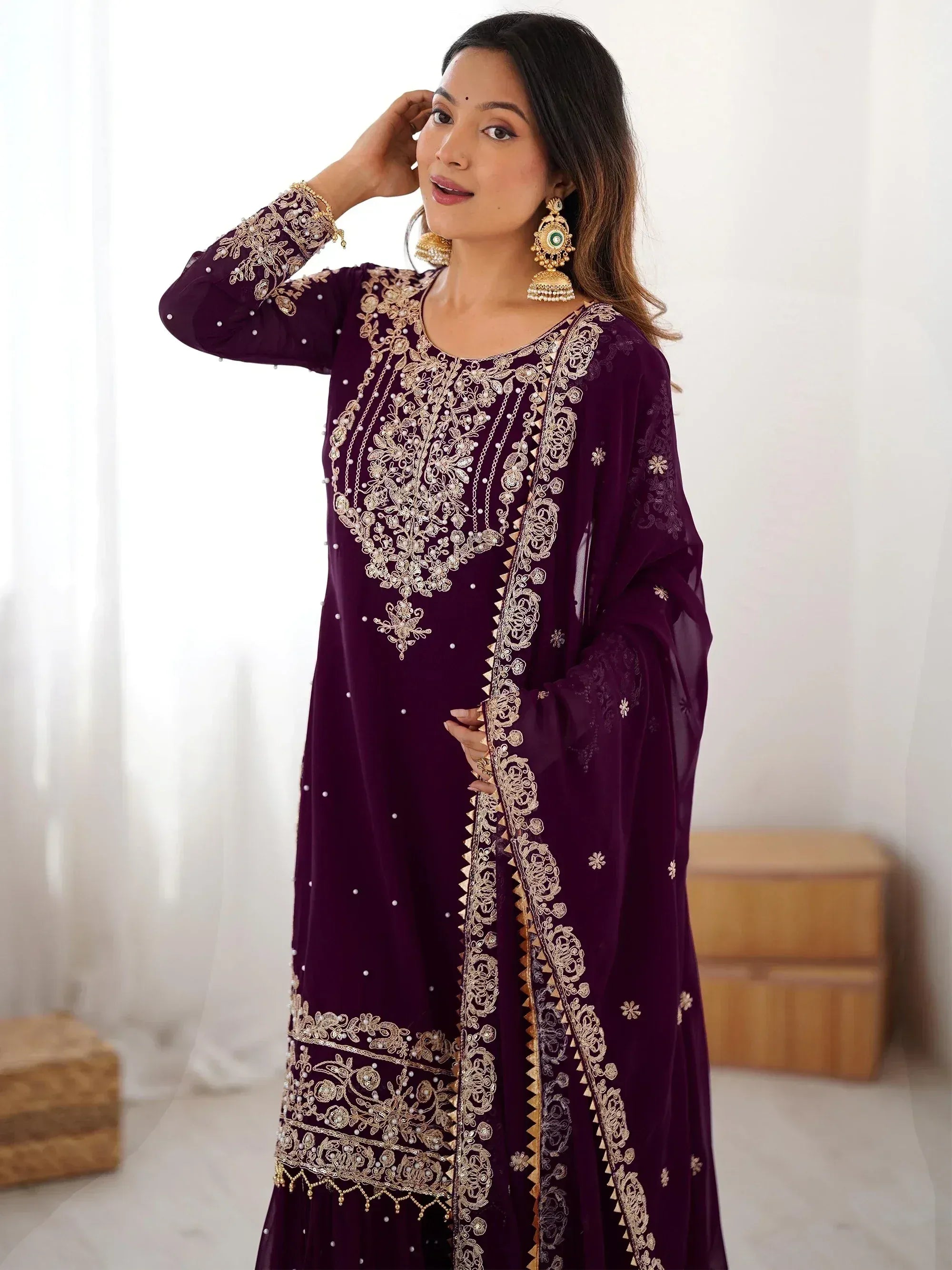 Glamorous Wine Embroidered Georgette Function Wear Sharara Suit