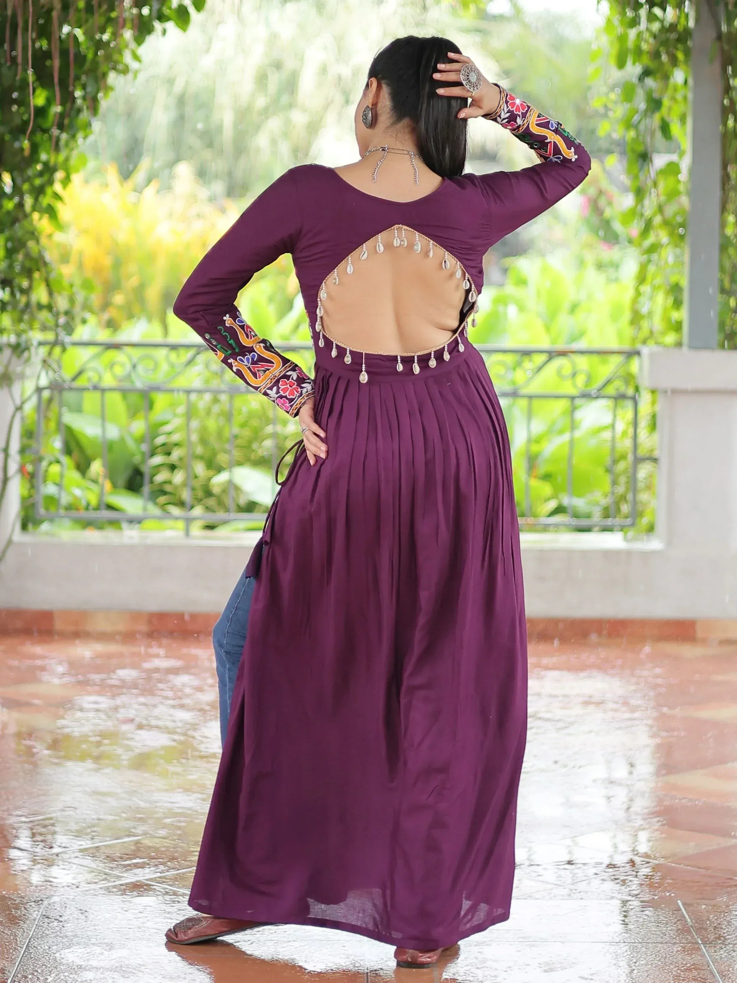 Purple ethnic gown with back cutout and embroidery, perfect for Indian wear