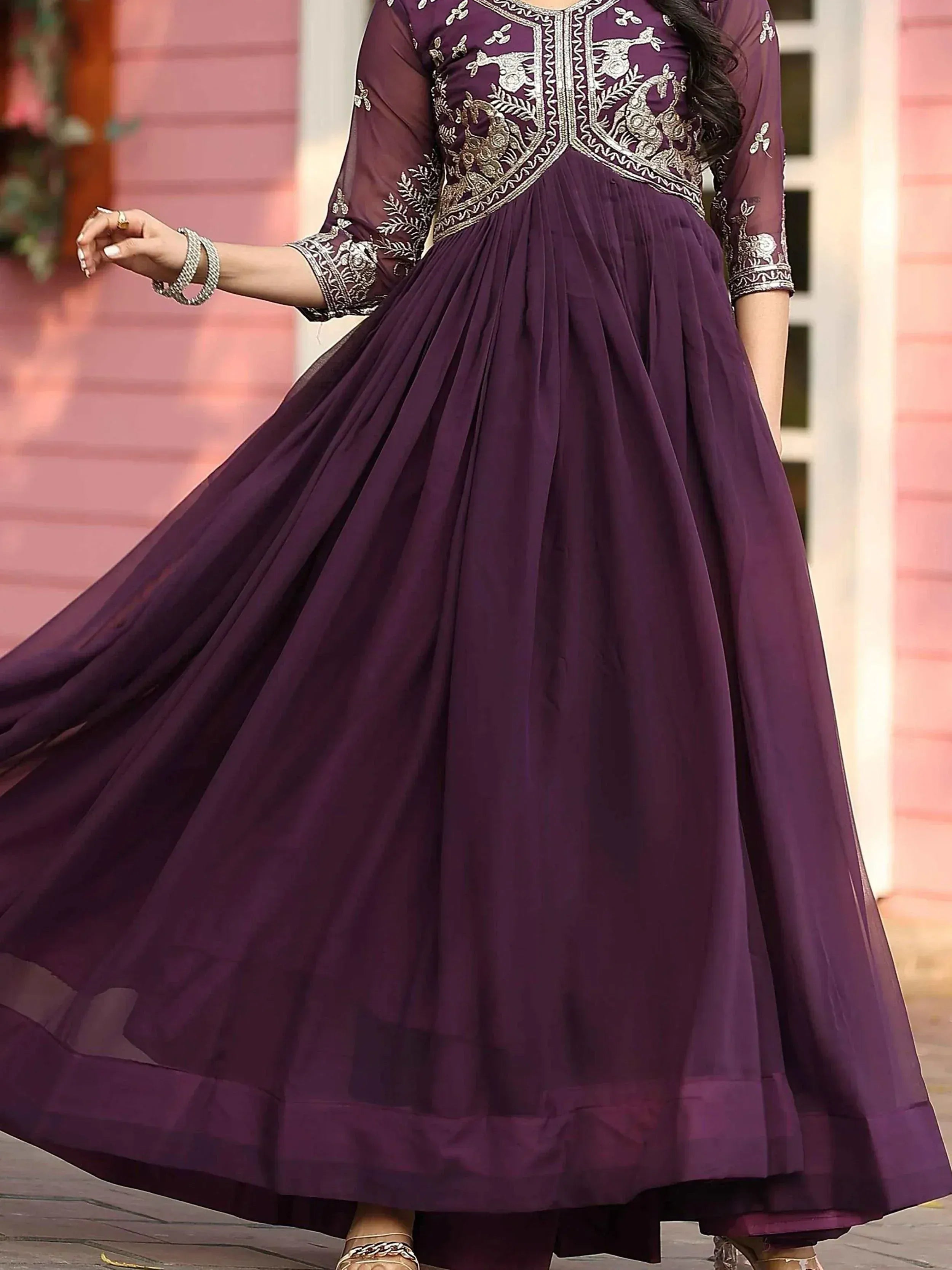 Purple ethnic gown with peacock embroidery, perfect for Indian weddings and festive occasions