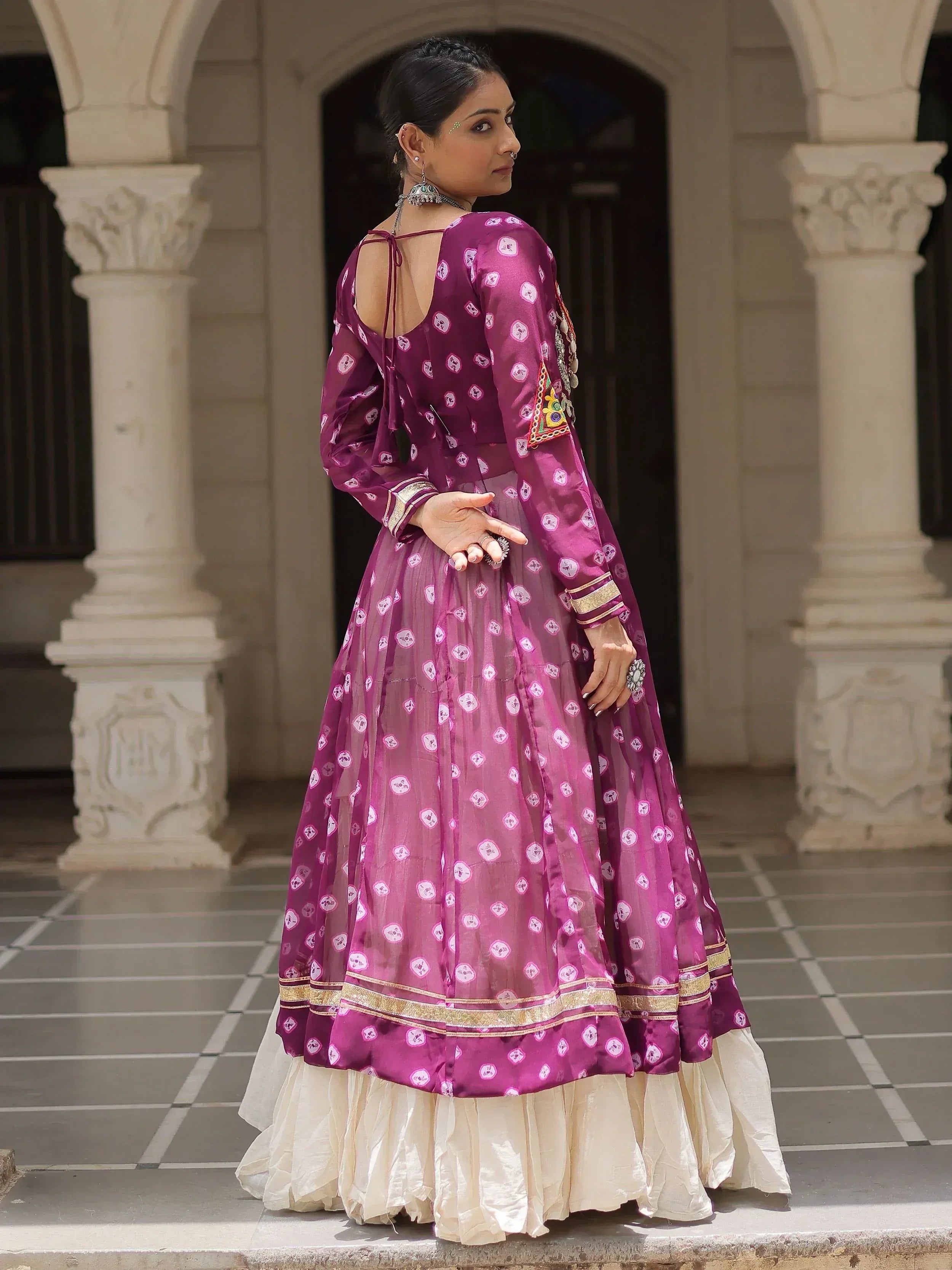 Purple printed designer lehenga choli with gold trim, perfect for Indian ethnic wear occasions