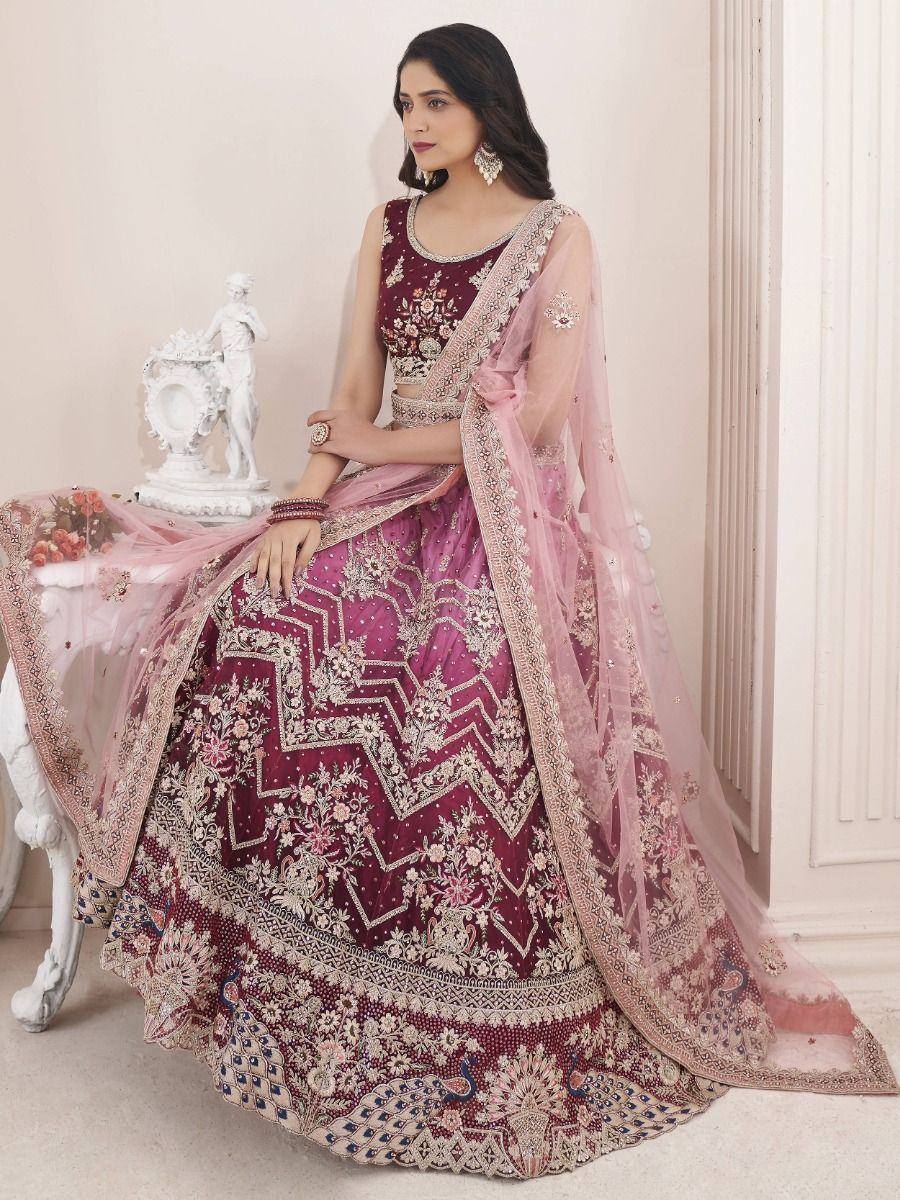 Maroon embroidered lehenga choli with pink dupatta, perfect for Indian weddings and festive occasions