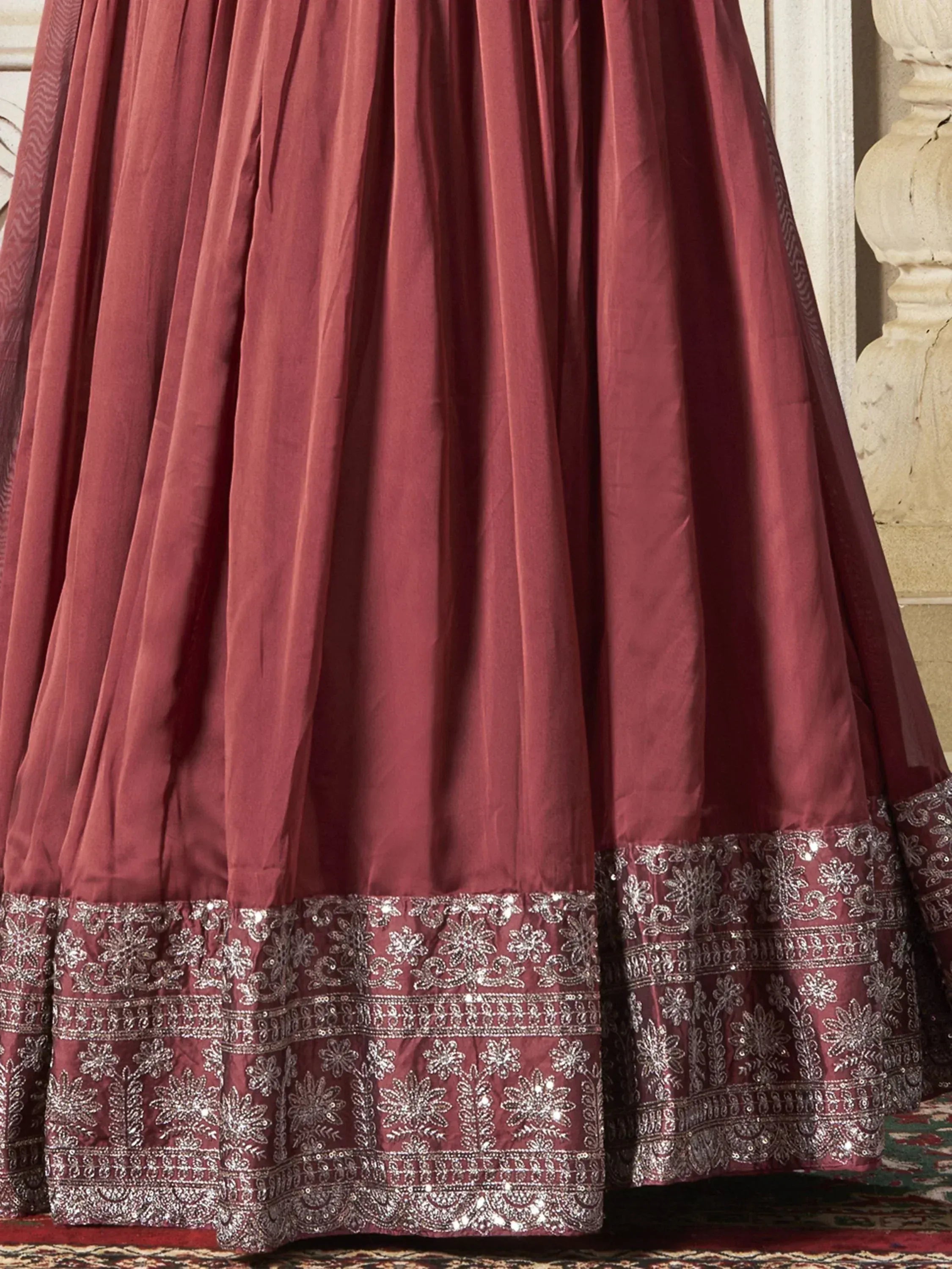 Maroon lehenga skirt with silver floral embroidery and sequin detailing, ethnic Indian wear