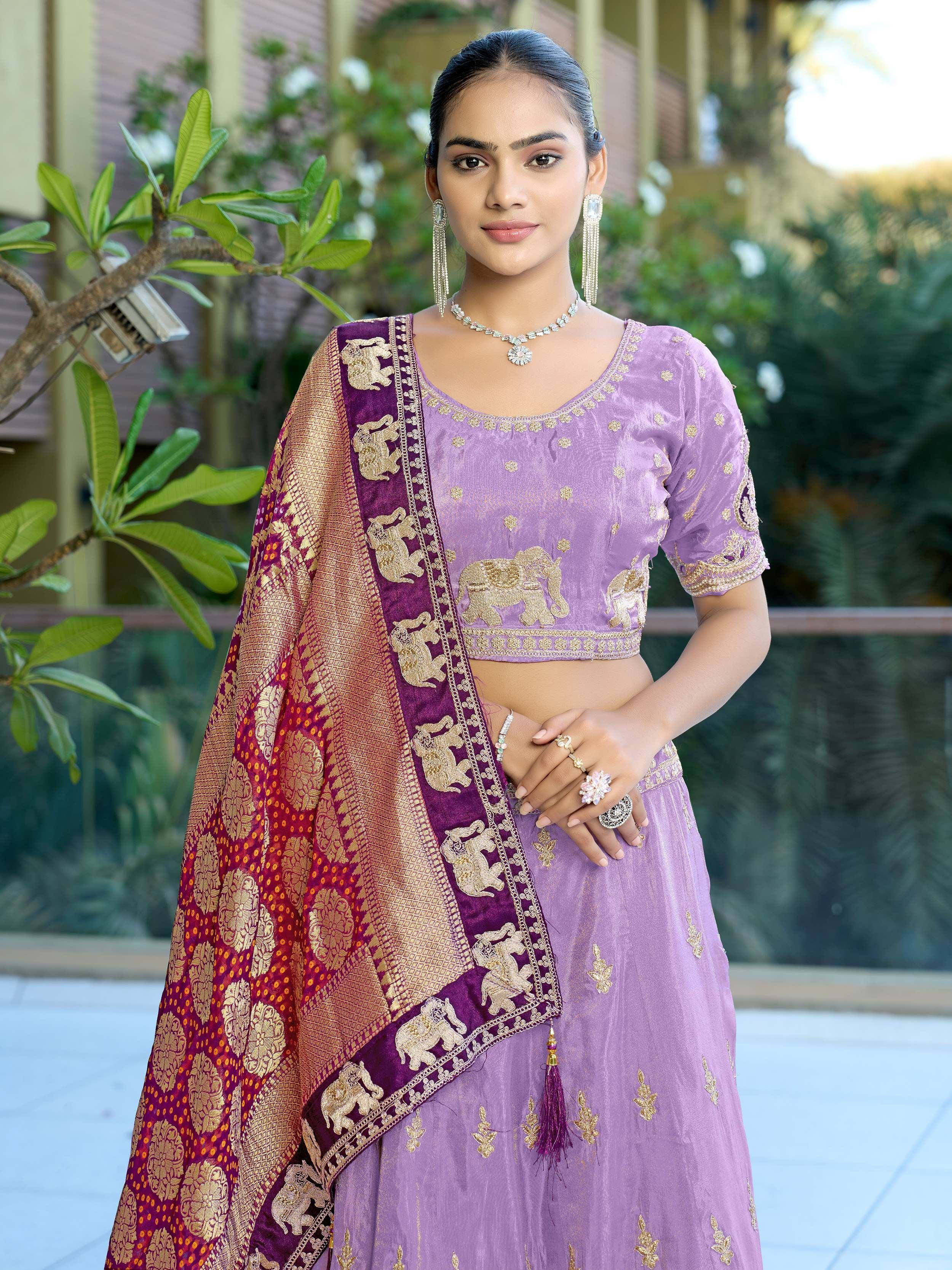 Purple embroidered lehenga choli with elephant motifs and maroon dupatta for Indian ethnic wear