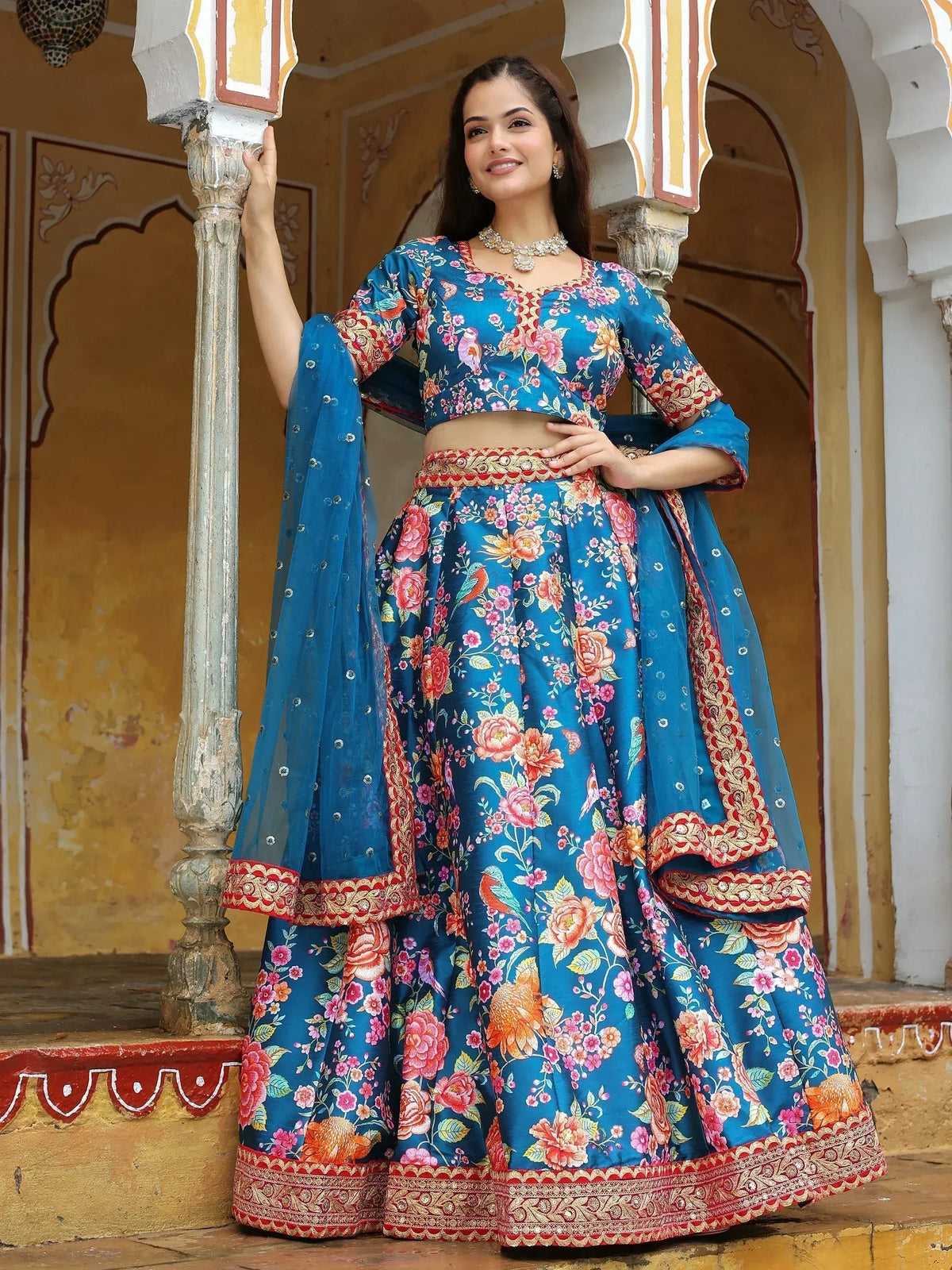 Blue floral lehenga choli with embroidered border, perfect for Indian ethnic wear occasions