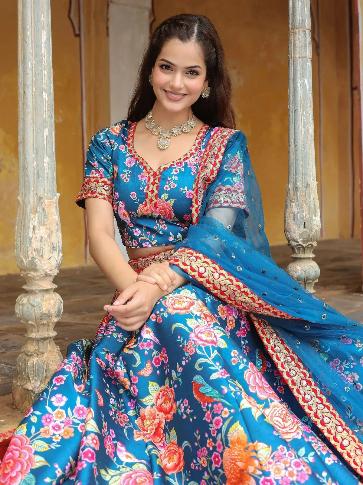 Blue floral lehenga choli with bird print, perfect for Indian ethnic wear and festive occasions.