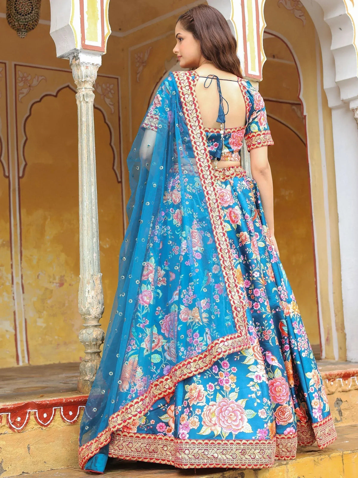Blue floral lehenga choli with gold embroidery, back view, Indian ethnic wear