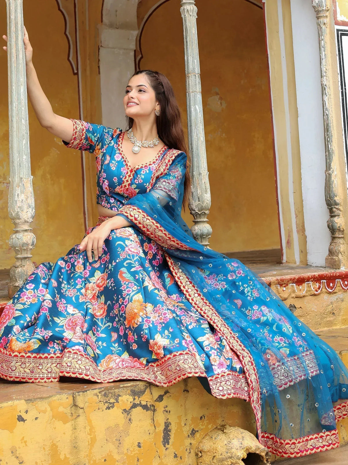Blue floral lehenga choli with intricate embroidery, perfect for Indian ethnic wear occasions