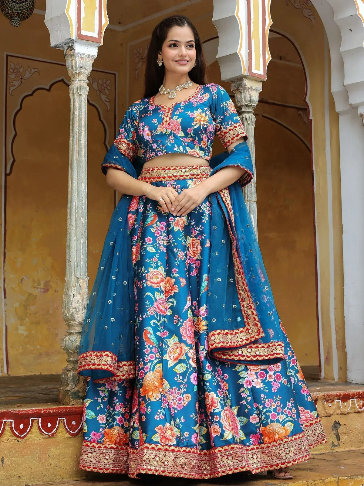 Blue floral print lehenga choli with gold embroidery, perfect for Indian ethnic occasions