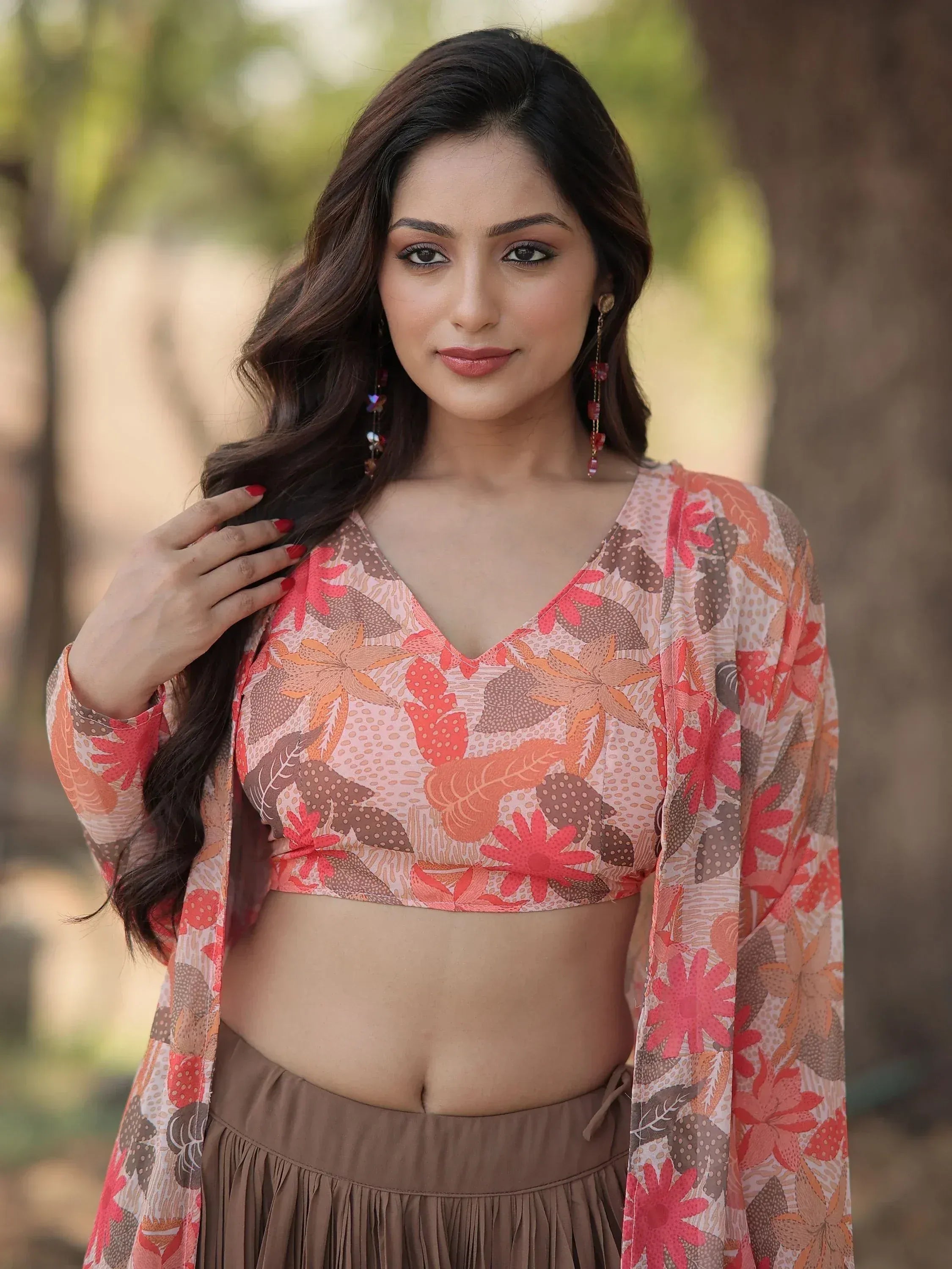 Woman in floral print ethnic crop top and palazzo pants, perfect for Indian festive wear