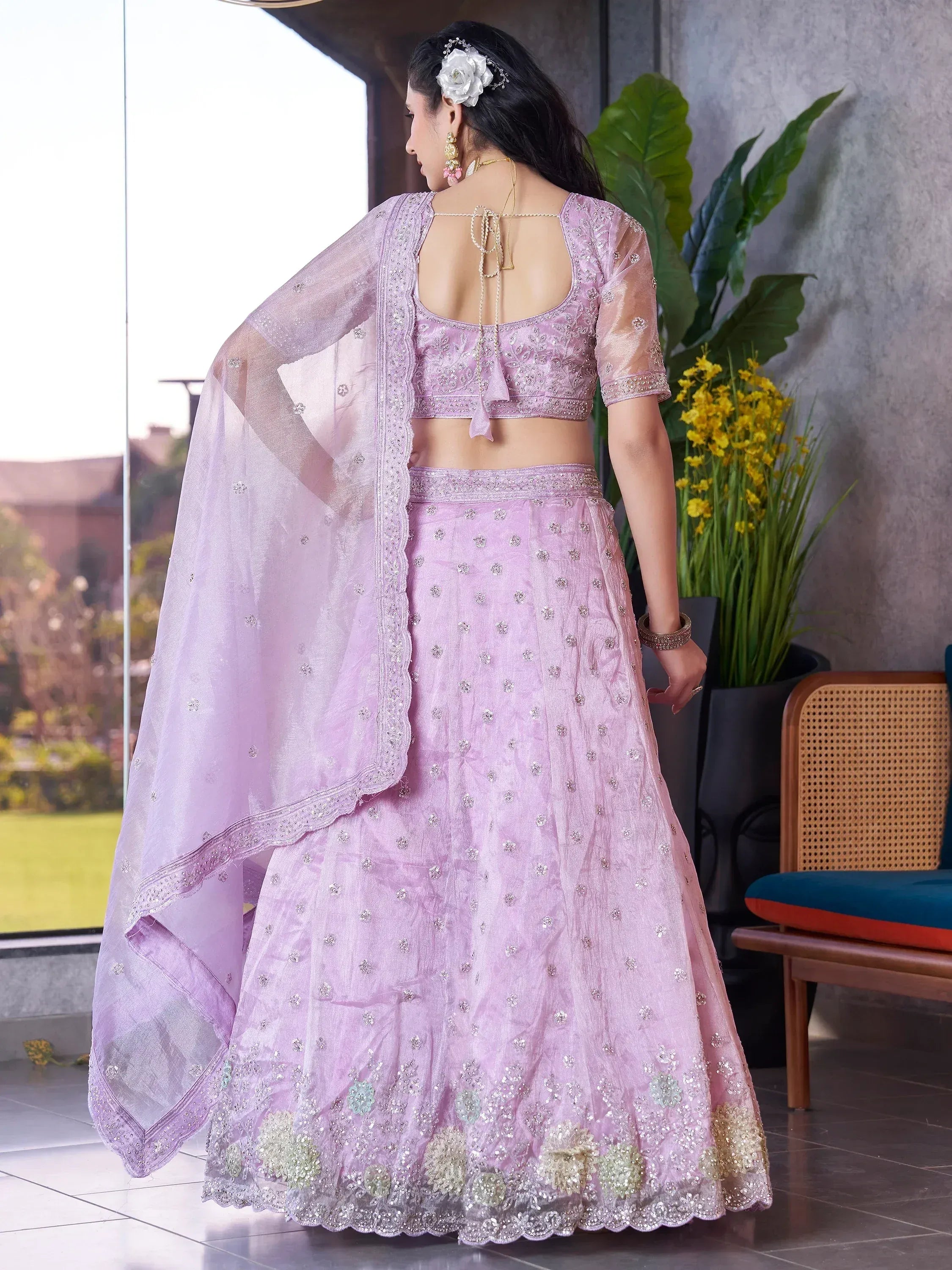 Lavender designer lehenga choli with floral embroidery and sheer dupatta, perfect for Indian ethnic wear events