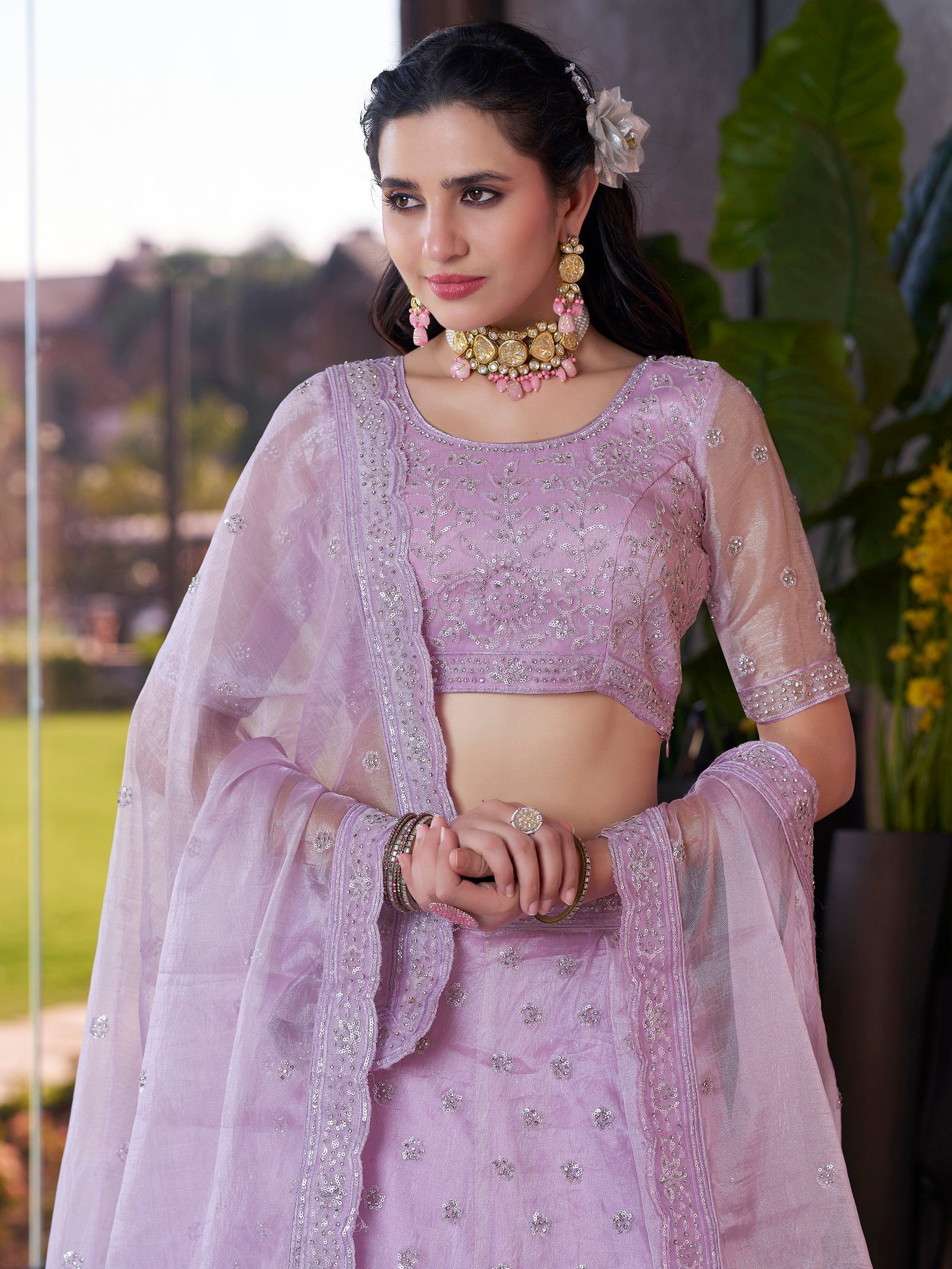 Lavender designer lehenga choli with sequin embroidery, perfect for Indian ethnic wear occasions.