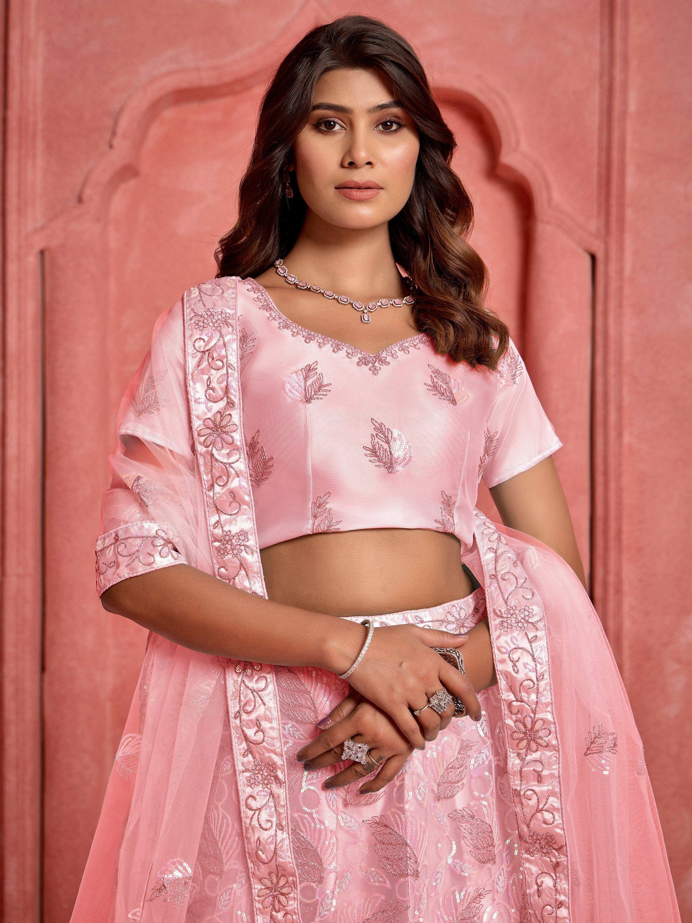 Pink embroidered lehenga choli with floral detailing, perfect for Indian ethnic wear occasions