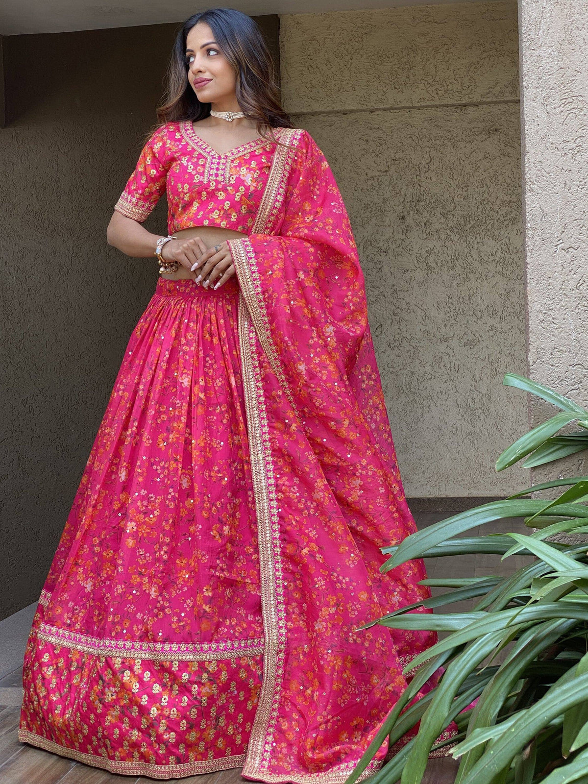 Pink floral lehenga choli with gold embroidery, perfect for Indian ethnic occasions
