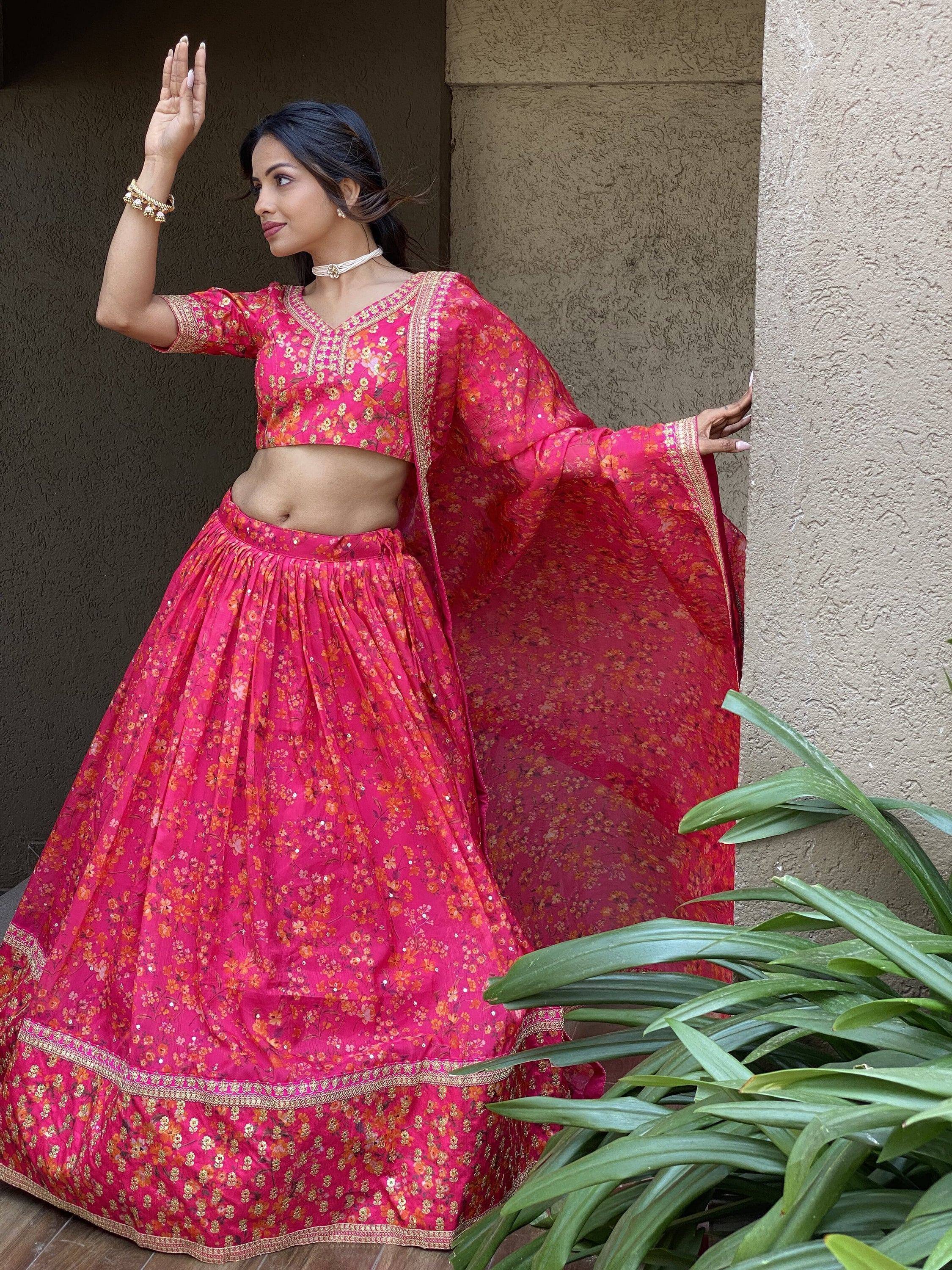Pink floral lehenga choli with gold embroidery, perfect for Indian ethnic wear and festive occasions.