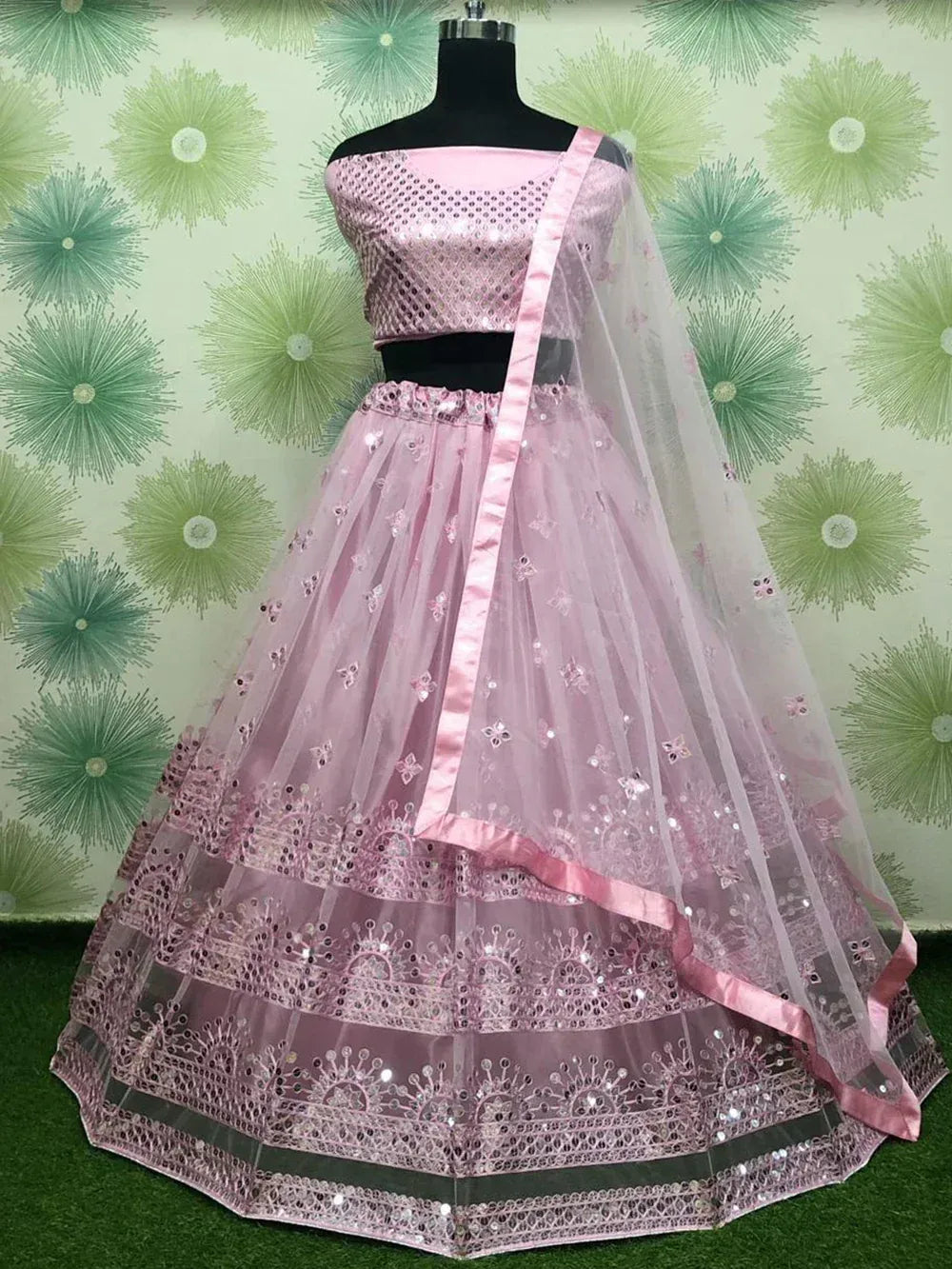 Pink designer lehenga choli with sequin embroidery and sheer dupatta, perfect for Indian ethnic occasions