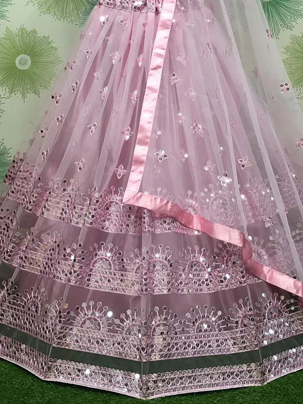 Pink embroidered lehenga with sequin detailing and layered skirt for Indian ethnic wear