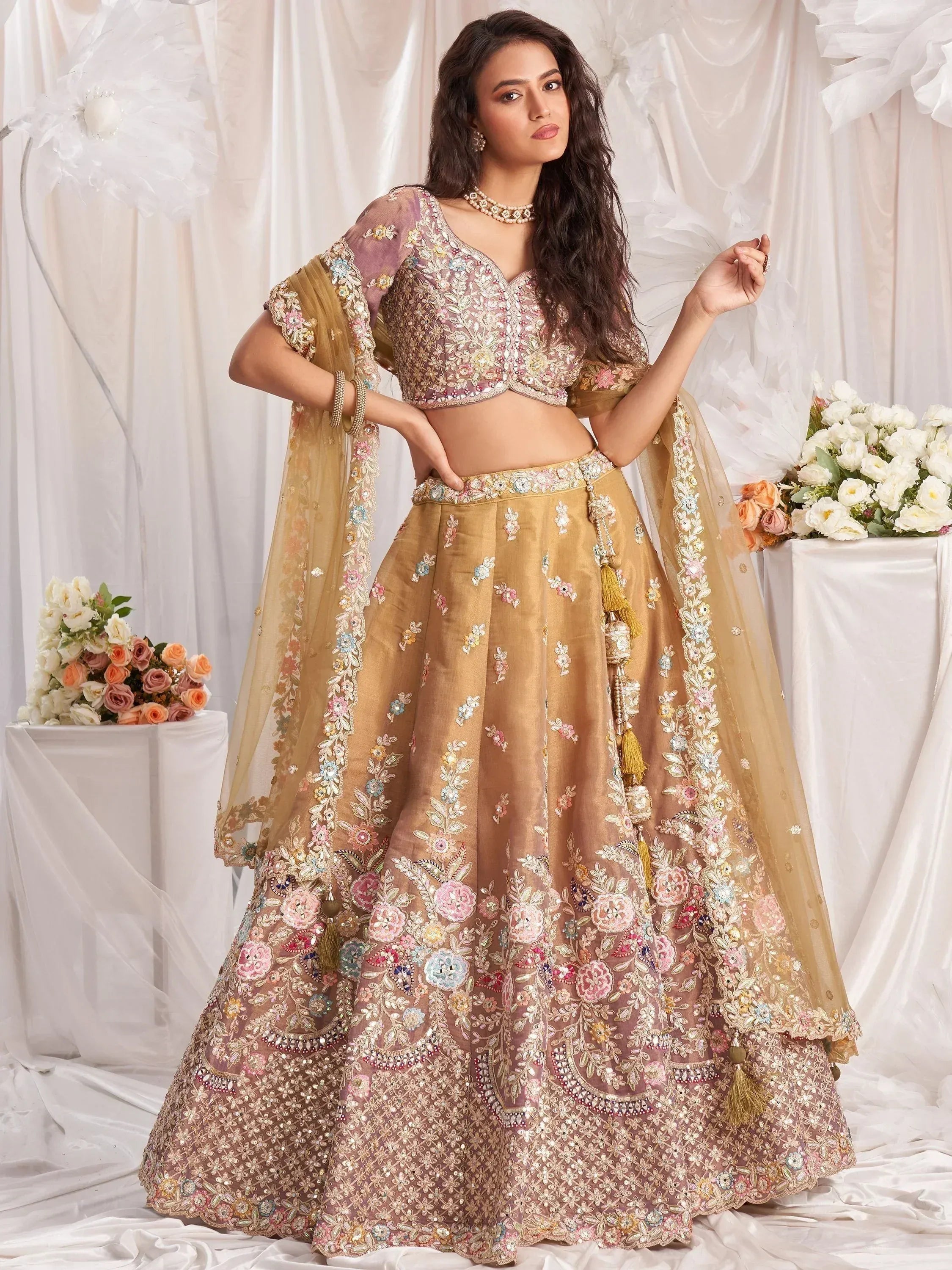 Elegant Indian lehenga choli with floral embroidery, perfect for weddings and festive occasions.