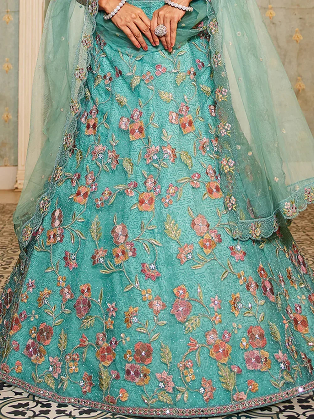 Teal floral embroidered lehenga choli with sheer dupatta, perfect for Indian ethnic wear occasions