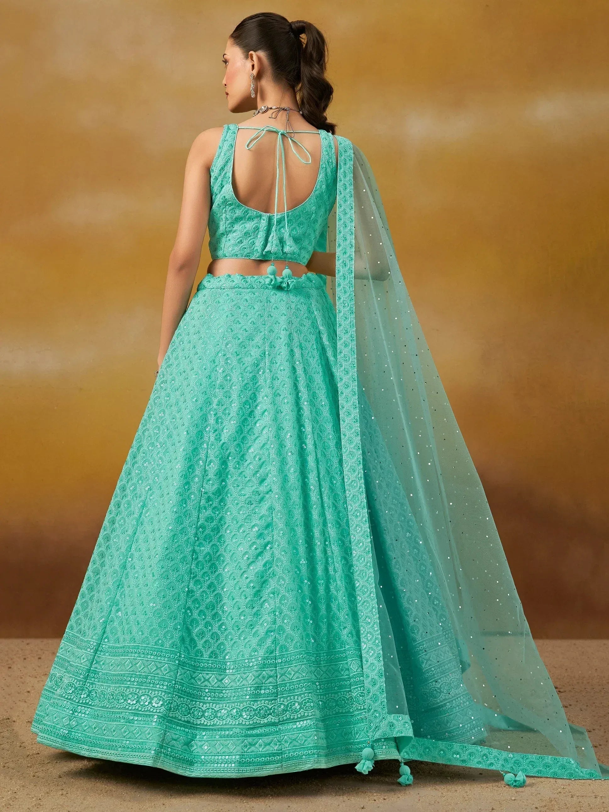 Mint green designer lehenga choli with back tie blouse and sequin dupatta, ethnic wear for women