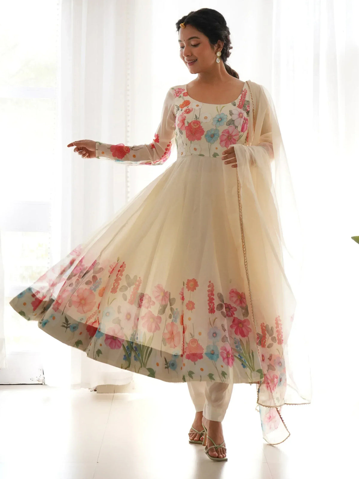 Floral embroidered ethnic gown with sheer dupatta, perfect for Indian festive occasions