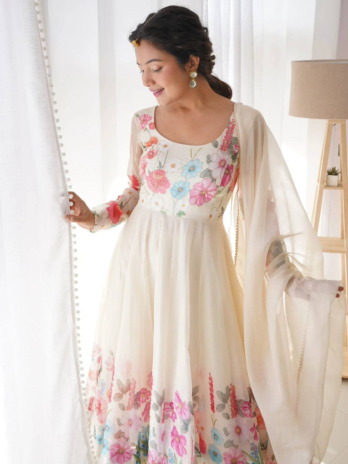 Floral embroidered white anarkali gown with sheer sleeves, perfect for Indian ethnic wear occasions