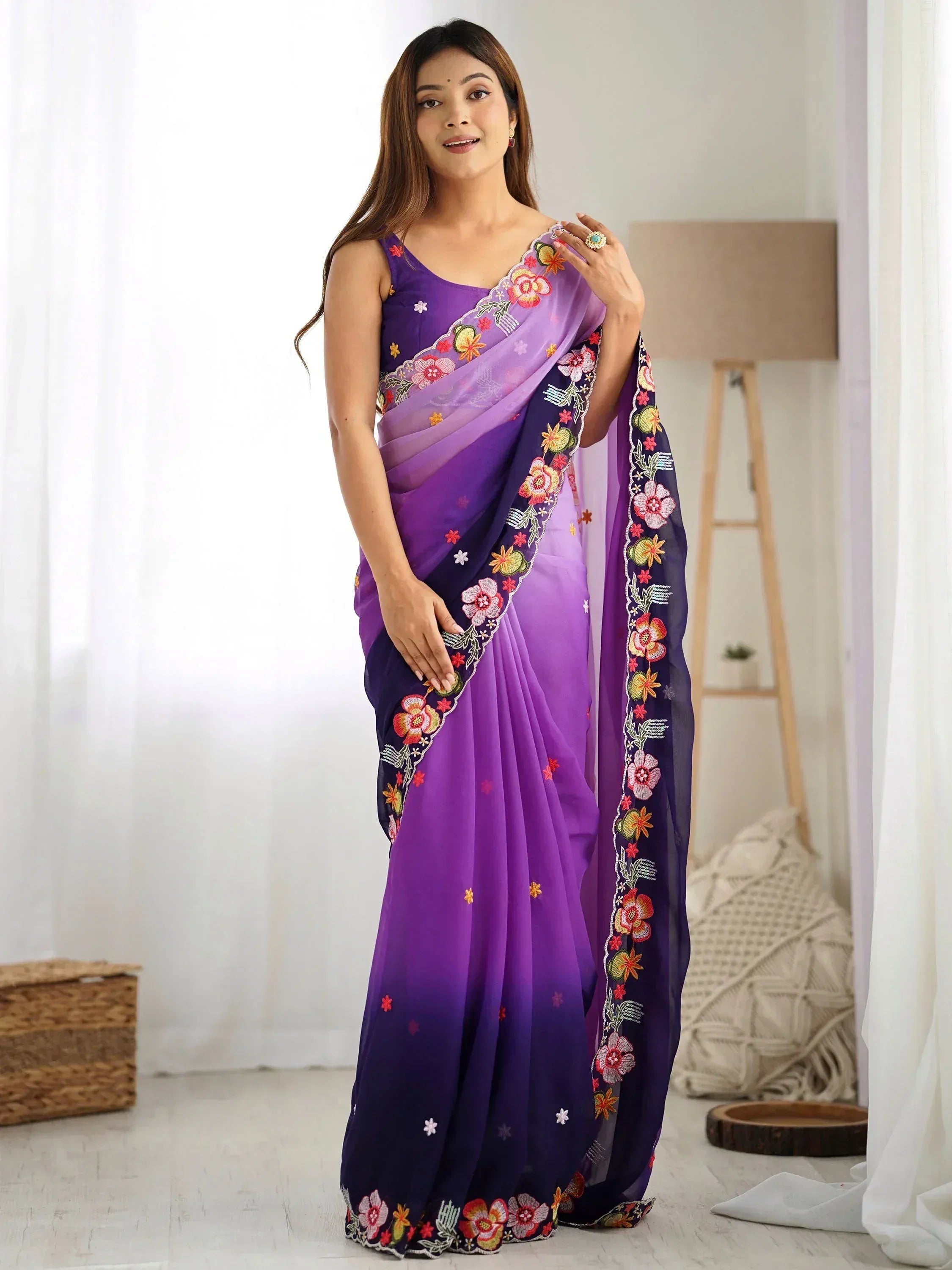 Purple ombre saree with floral embroidery, perfect for Indian ethnic wear occasions.