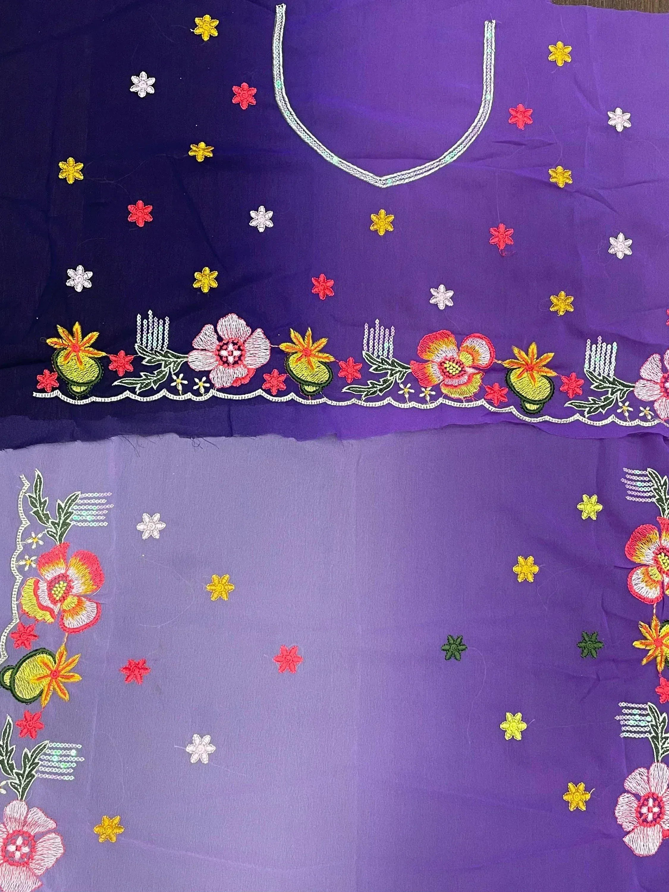 Purple ethnic kurti with floral embroidery and sequin detailing, perfect for Indian wear