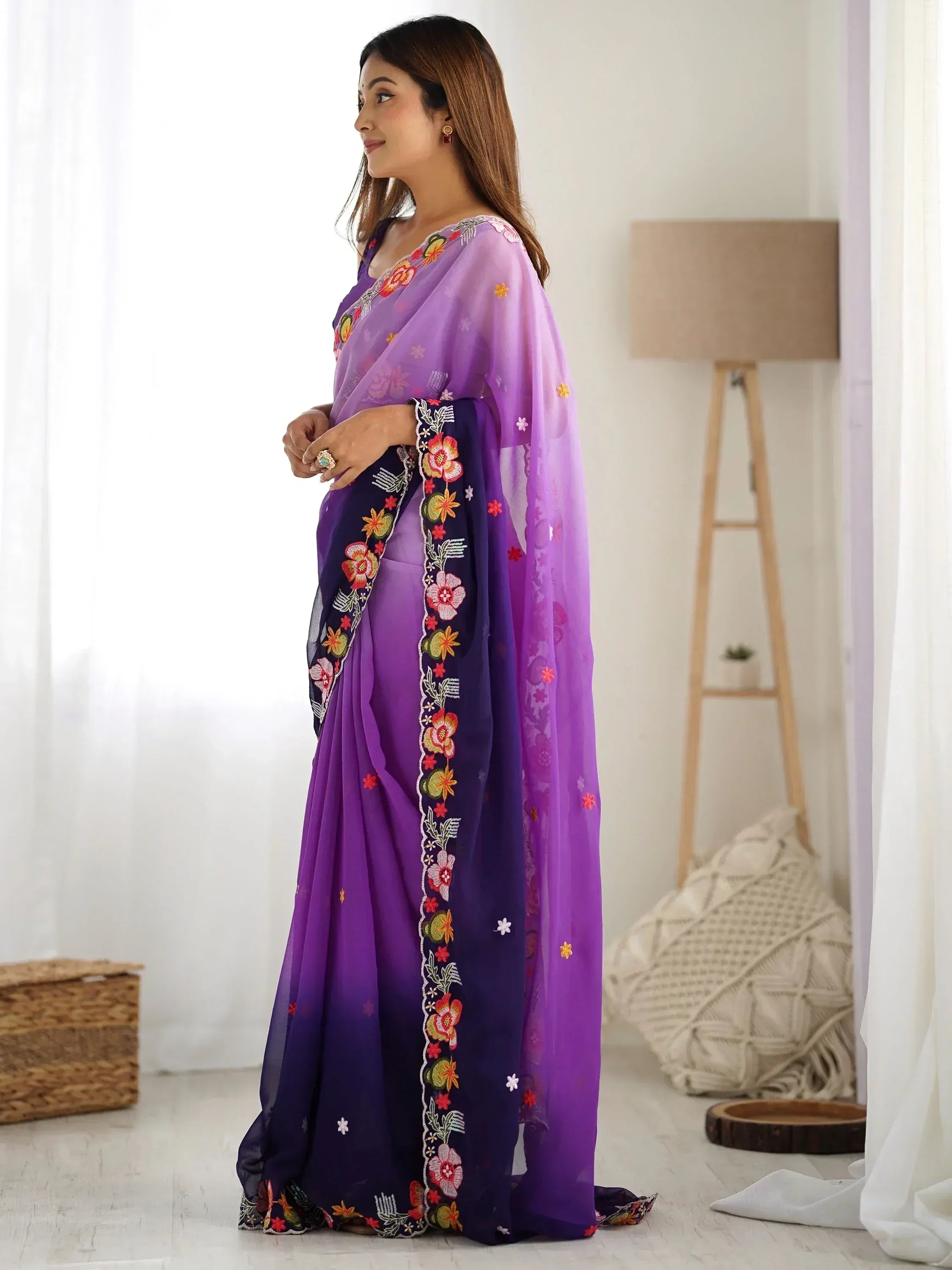 Purple floral embroidered saree with gradient design, perfect for ethnic occasions