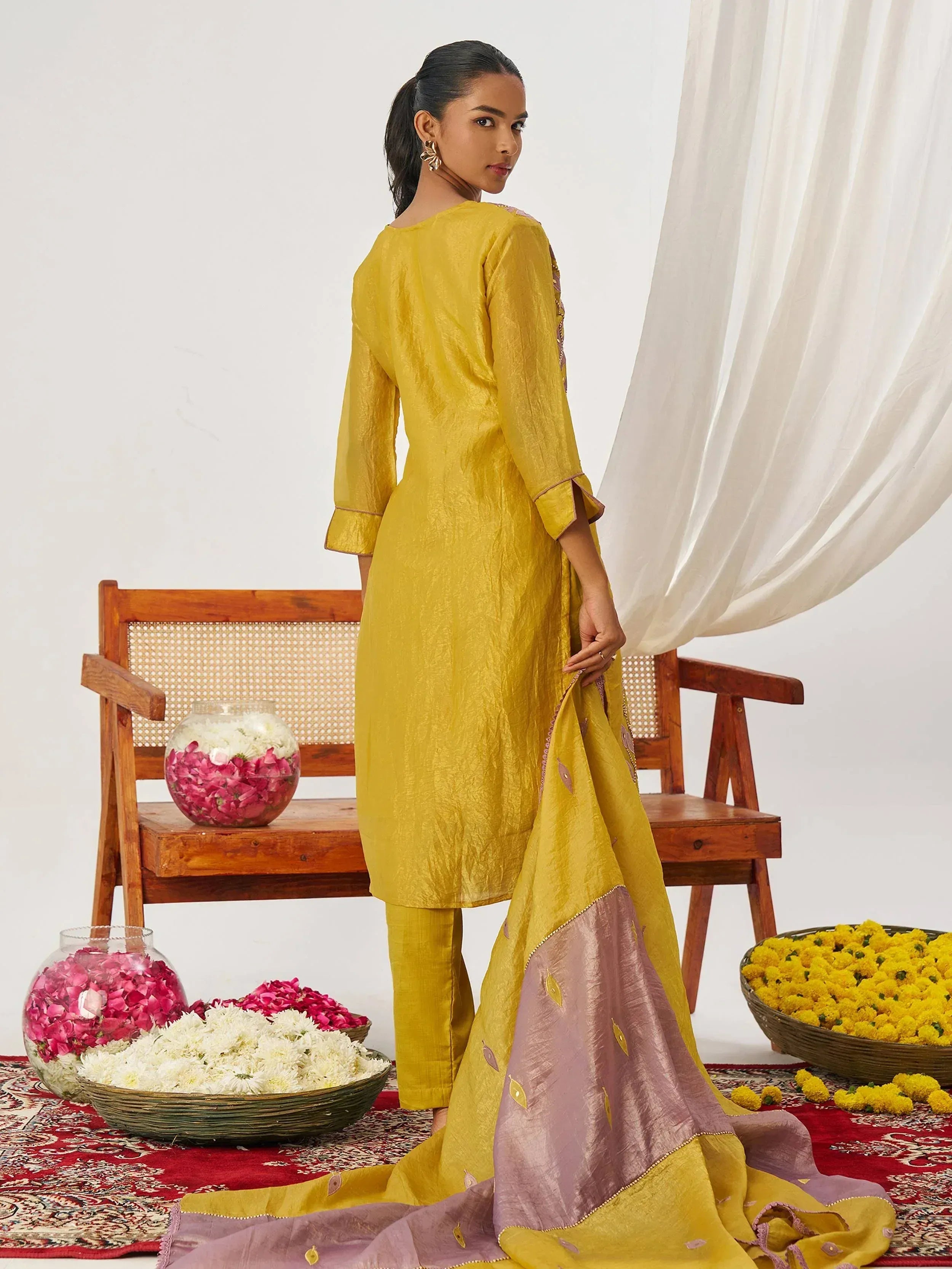 Yellow ethnic salwar kameez with embroidered dupatta, perfect for Indian occasions and festivals.