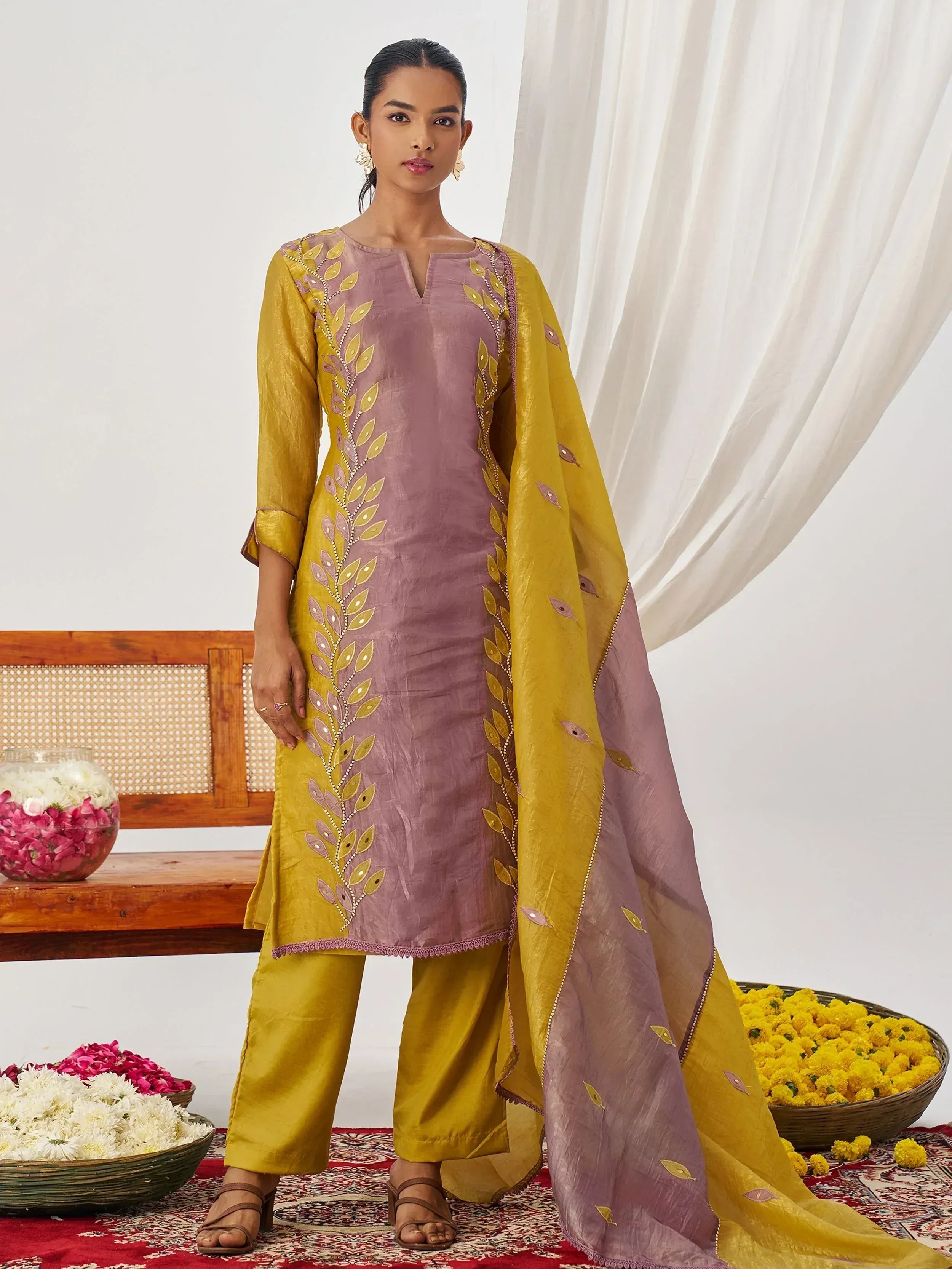 Purple and mustard yellow embroidered salwar kameez with leaf motifs, perfect for Indian ethnic wear