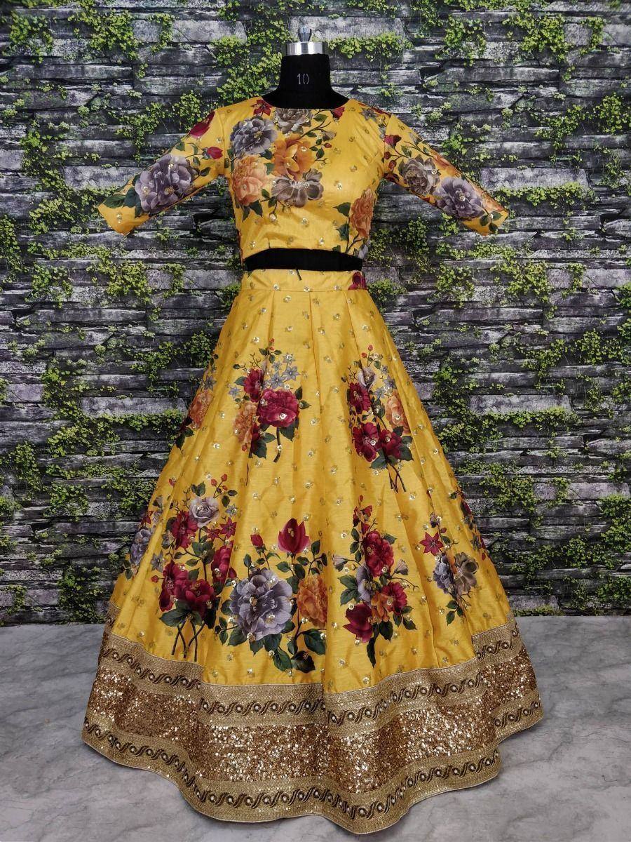Yellow floral print lehenga choli with gold border, perfect for Indian ethnic occasions