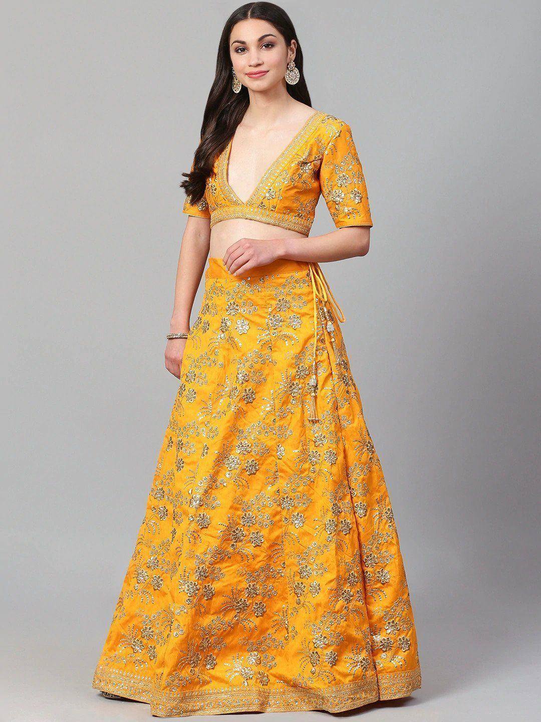 Yellow floral embroidered lehenga choli with V-neck blouse, perfect for Indian ethnic wear occasions