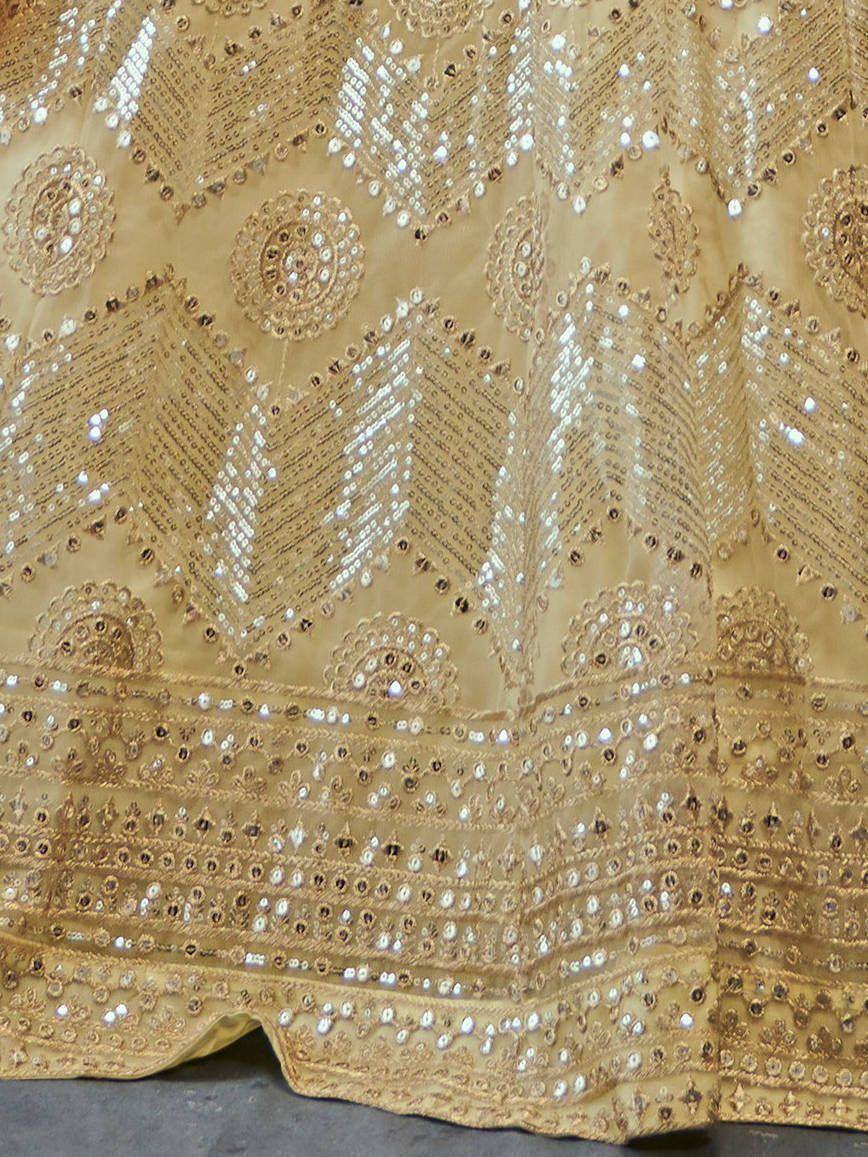 Gold embroidered lehenga with intricate mirror and beadwork, perfect for Indian ethnic wear