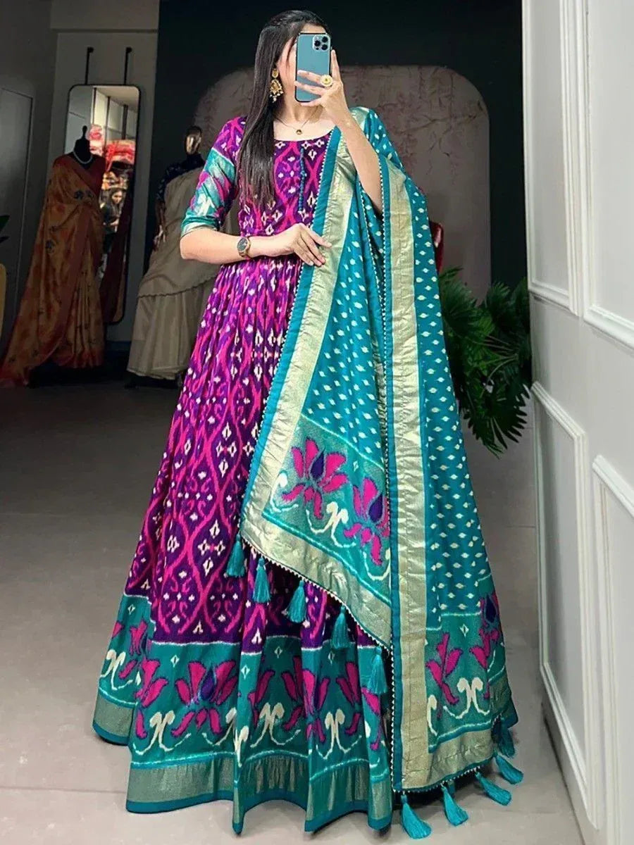 Vibrant purple and teal printed anarkali suit with floral dupatta, perfect for Indian ethnic occasions