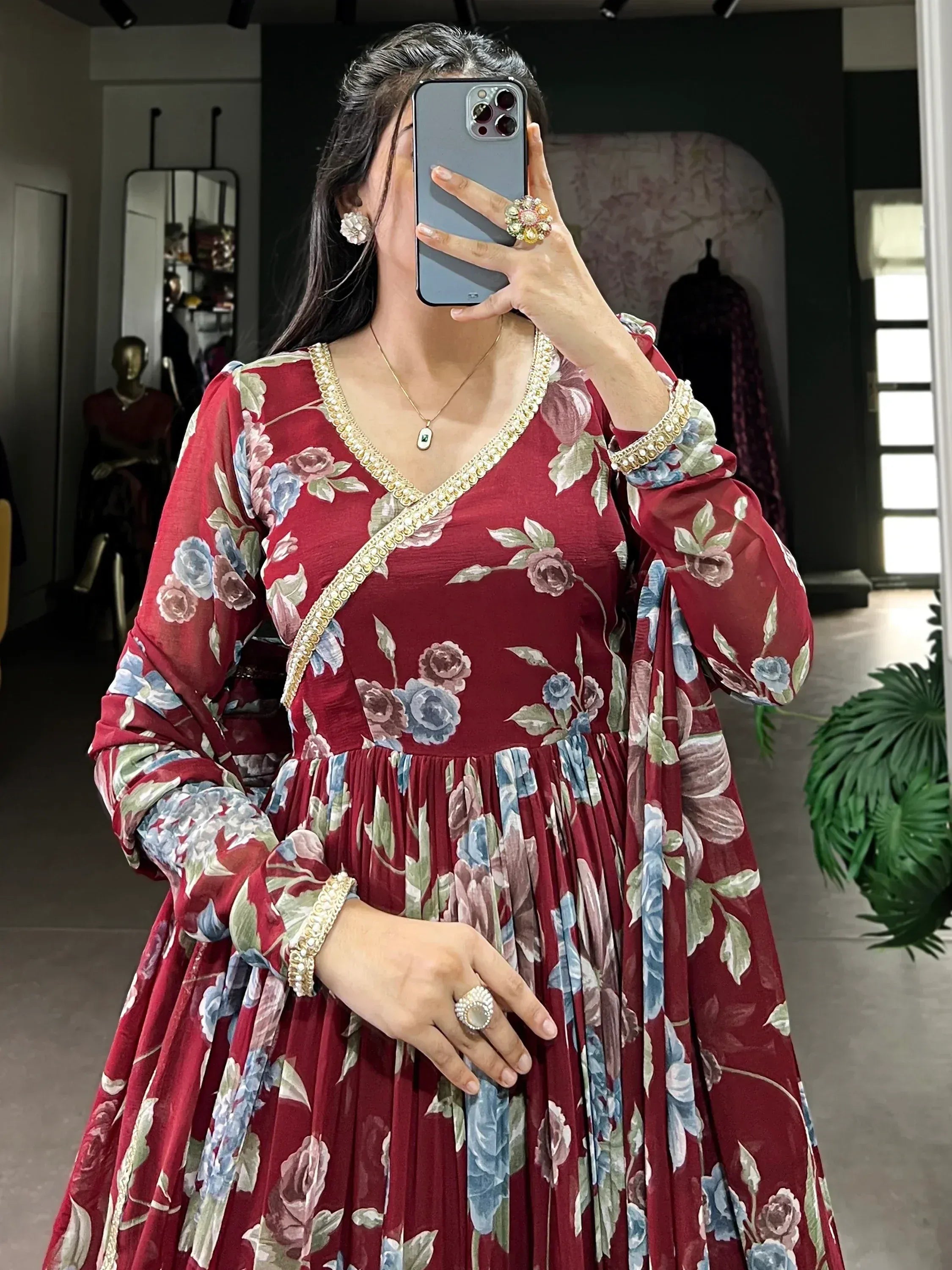 Red floral ethnic gown with gold trim, perfect for Indian occasions and festive wear