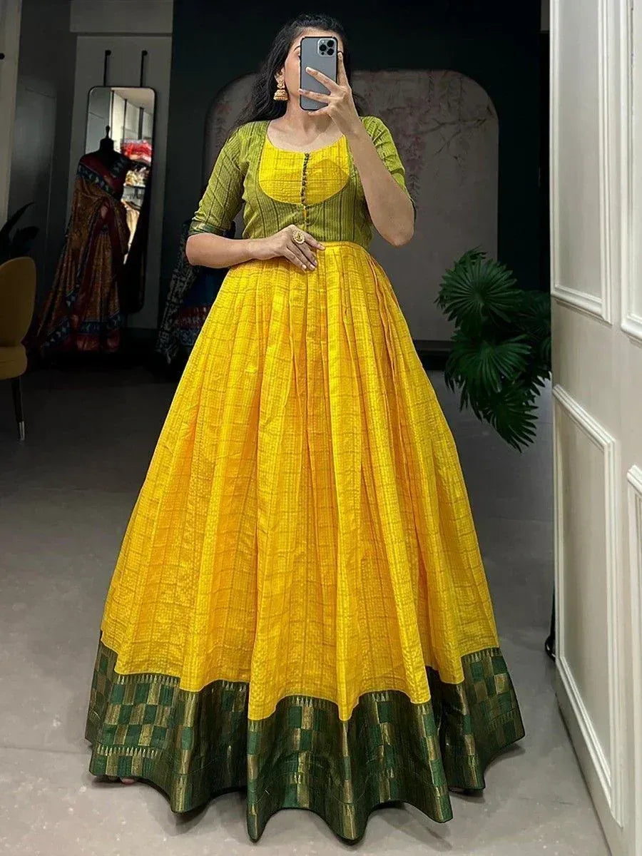 Vibrant yellow and green ethnic gown with pleated skirt, perfect for Indian occasions and festivals