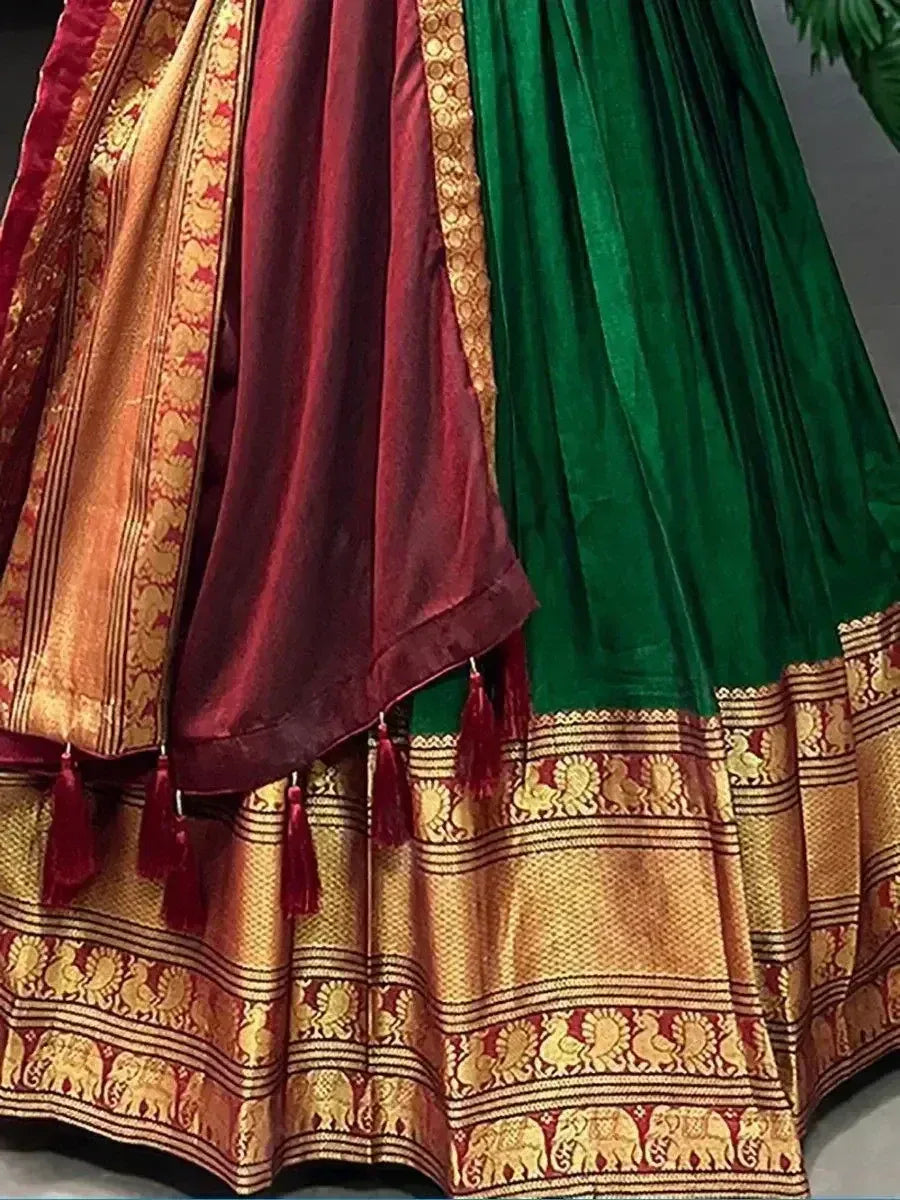 Green and maroon velvet lehenga with gold elephant border and tassels, Indian ethnic wear